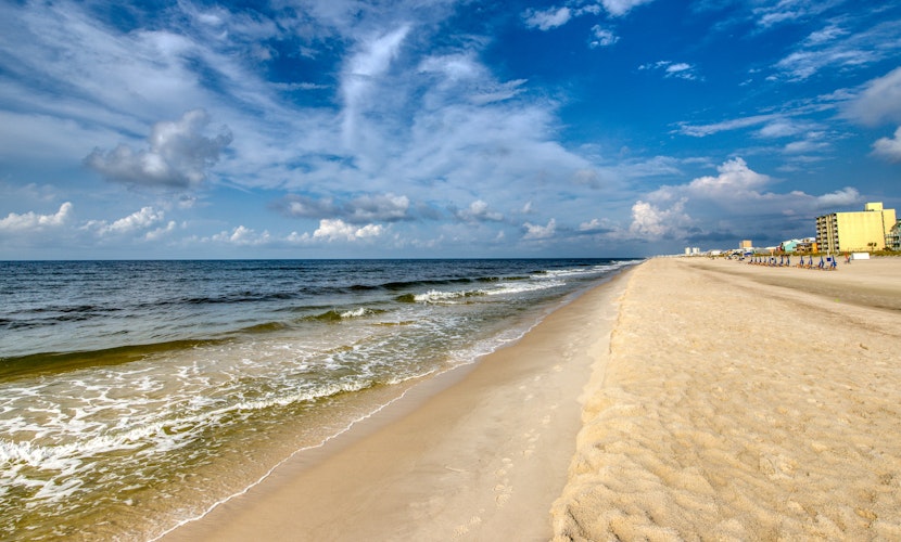 Sunny condo with boardwalk beach access, on-site pool, & private balcony