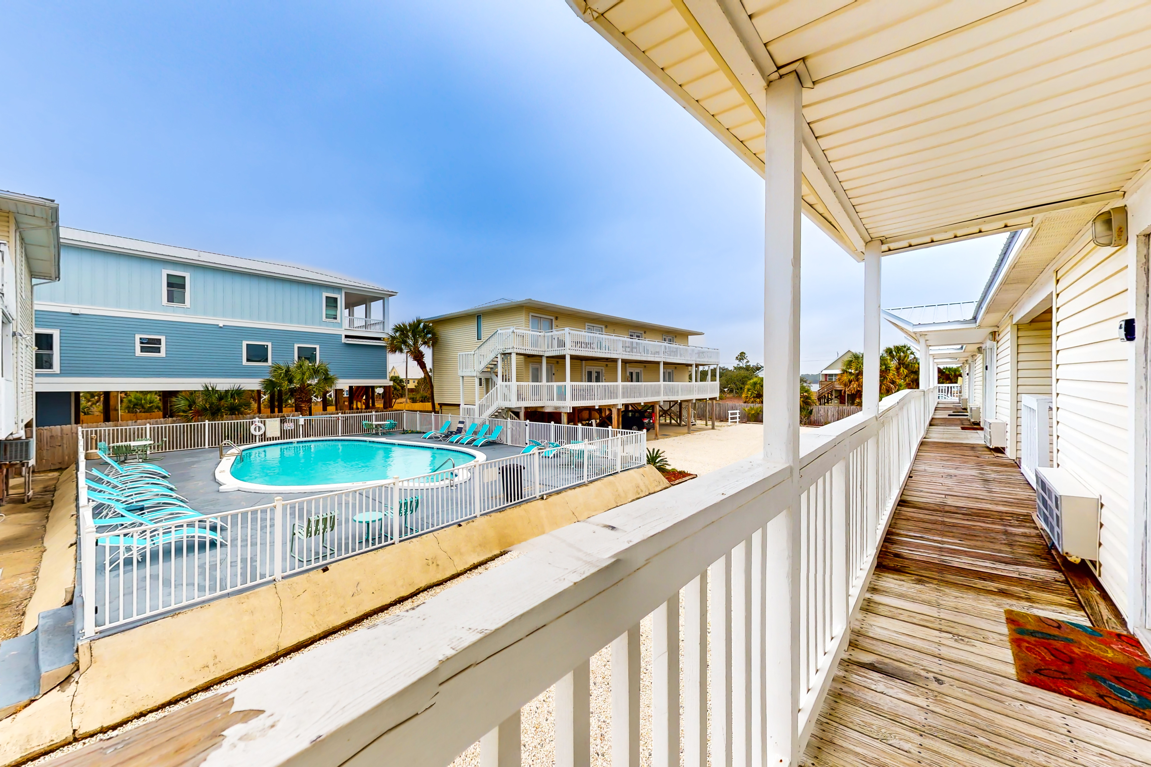 Sunny condo with boardwalk beach access, on-site pool, & private balcony