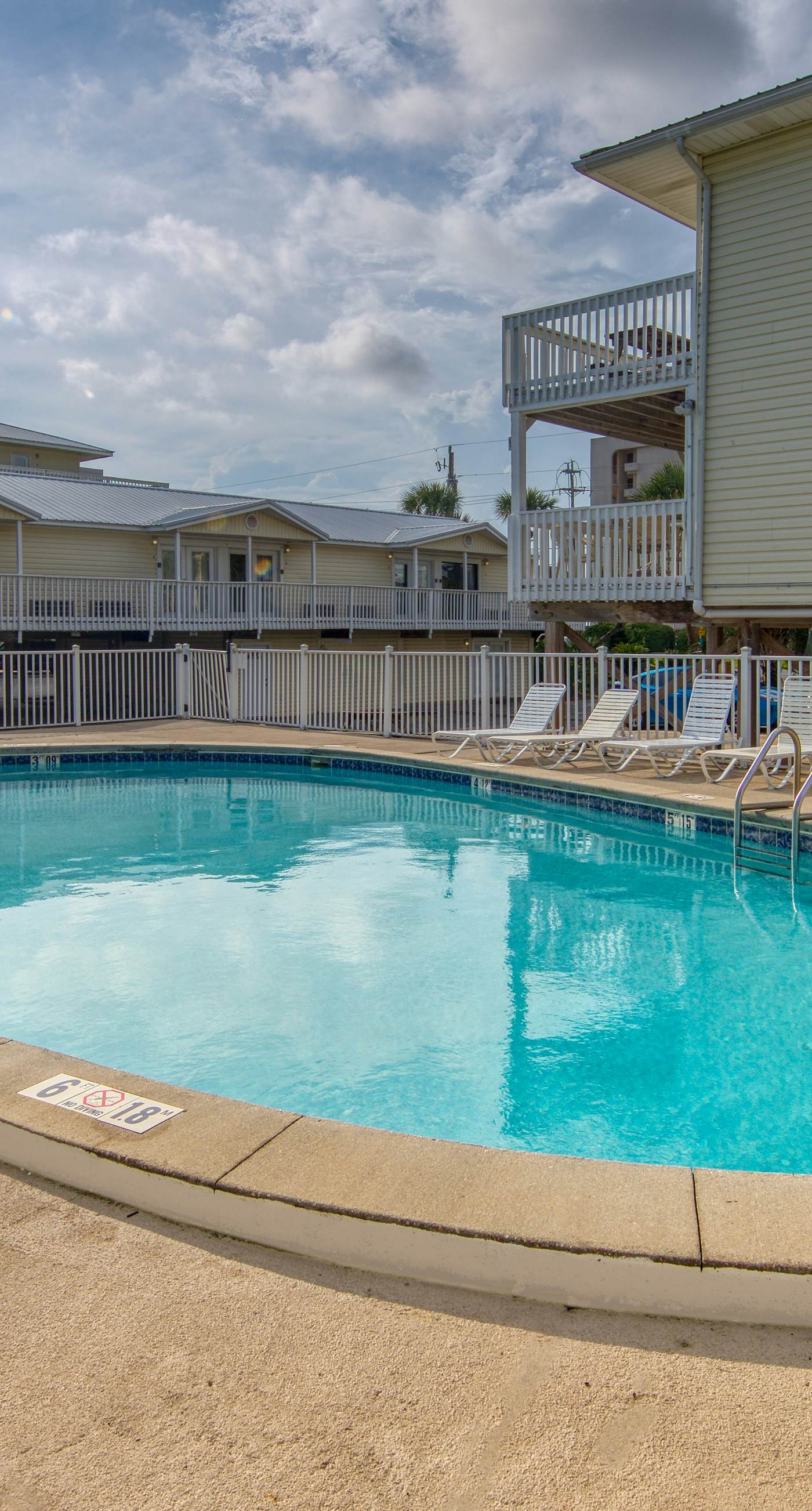 Sunny condo with boardwalk beach access, on-site pool, & private balcony