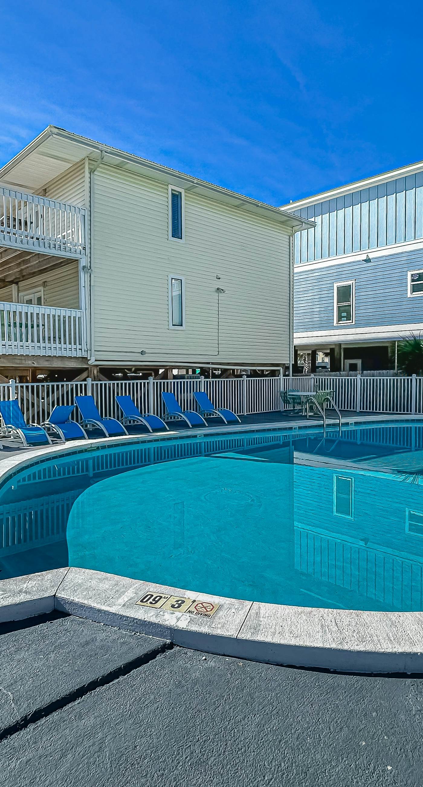 Sunny condo with boardwalk beach access, on-site pool, & private balcony