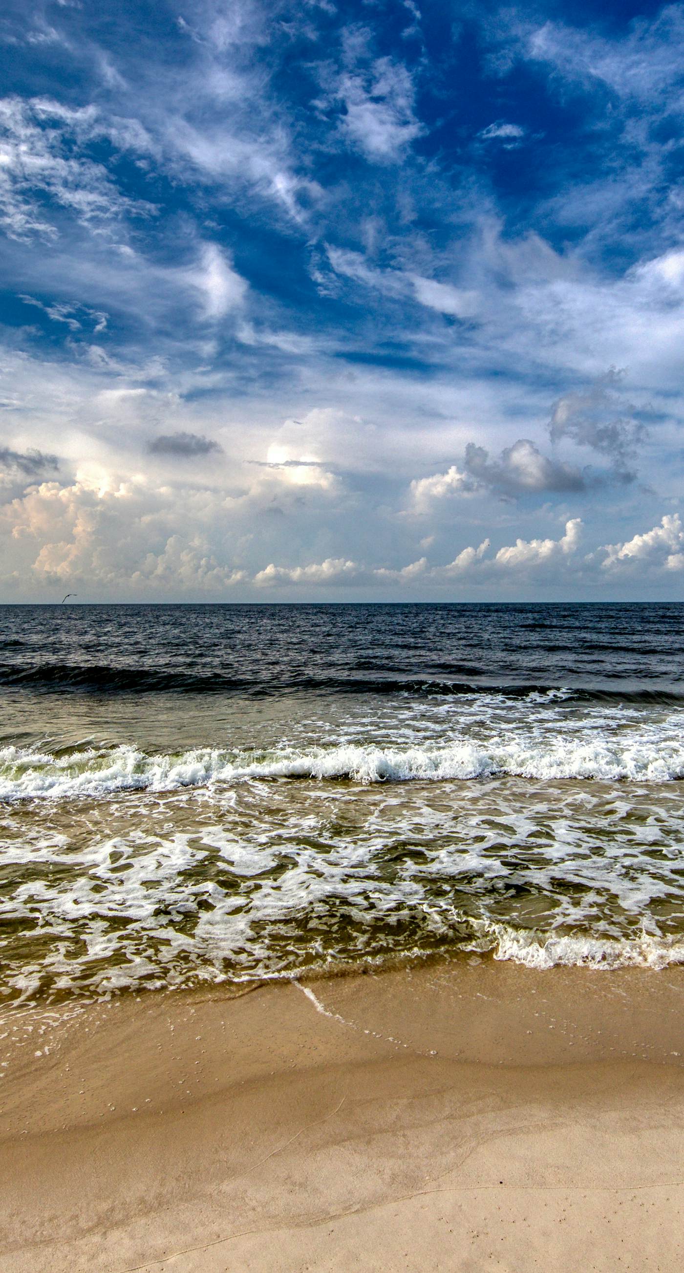 Sunny condo with boardwalk beach access, on-site pool, & private balcony