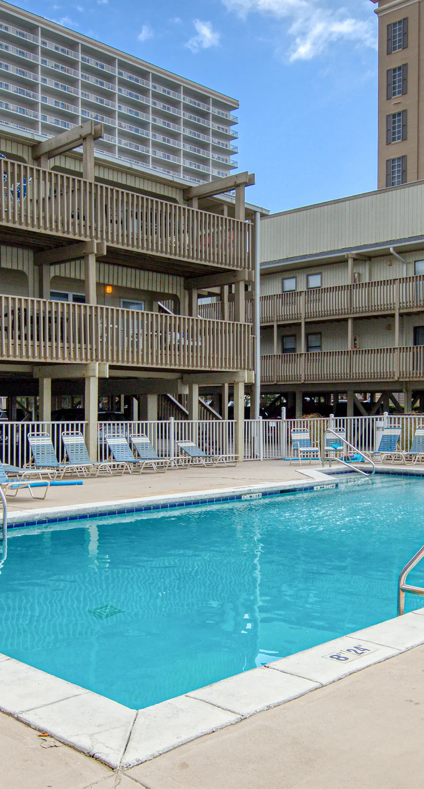 Beachfront condo with Gulf views, outdoor pool, large wrap-around balcony, & W&D