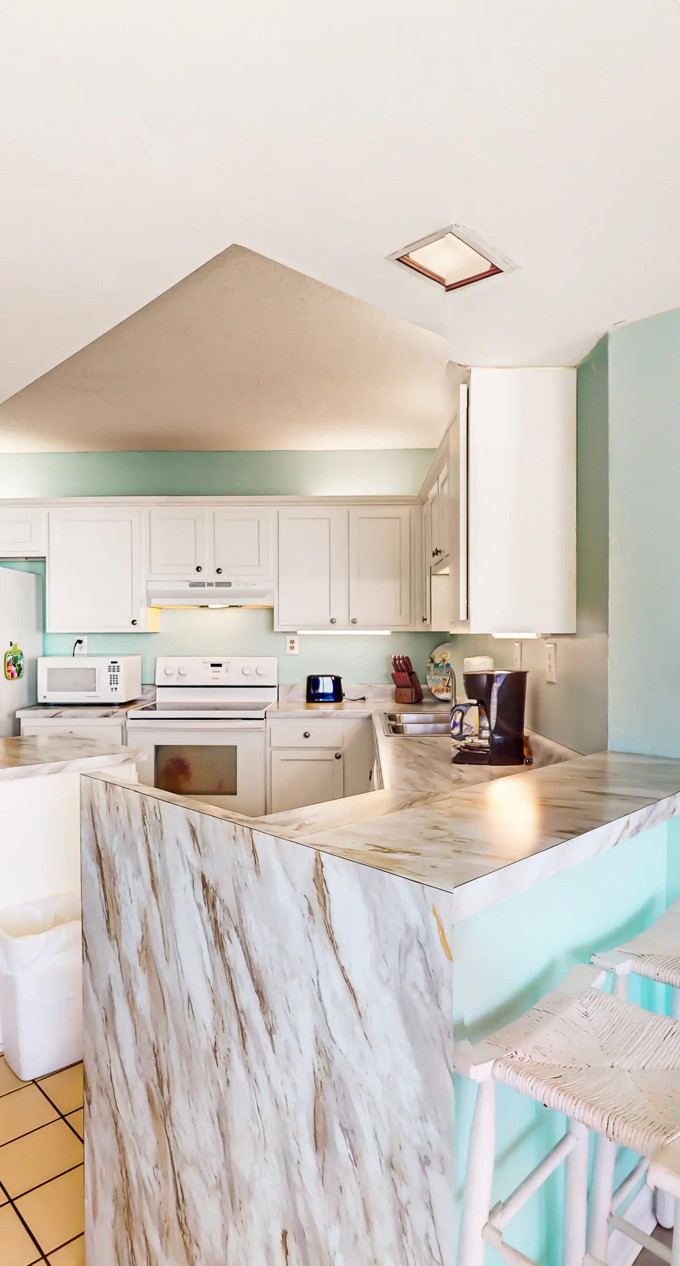 Beachfront condo with Gulf views, outdoor pool, large wrap-around balcony, & W&D
