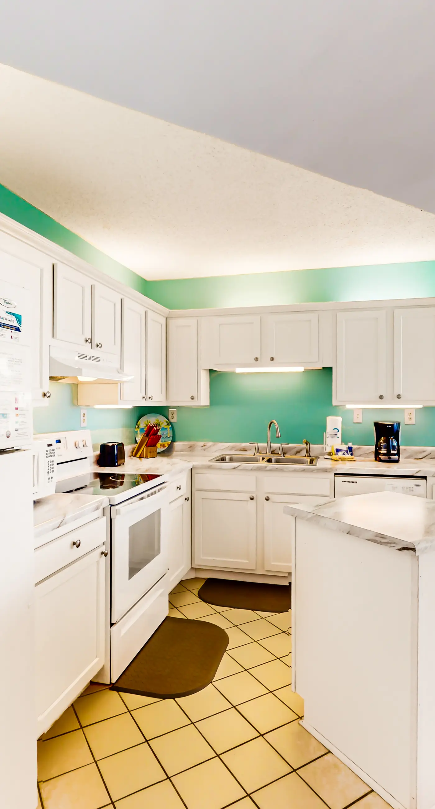 Beachfront condo with Gulf views, outdoor pool, large wrap-around balcony, & W&D