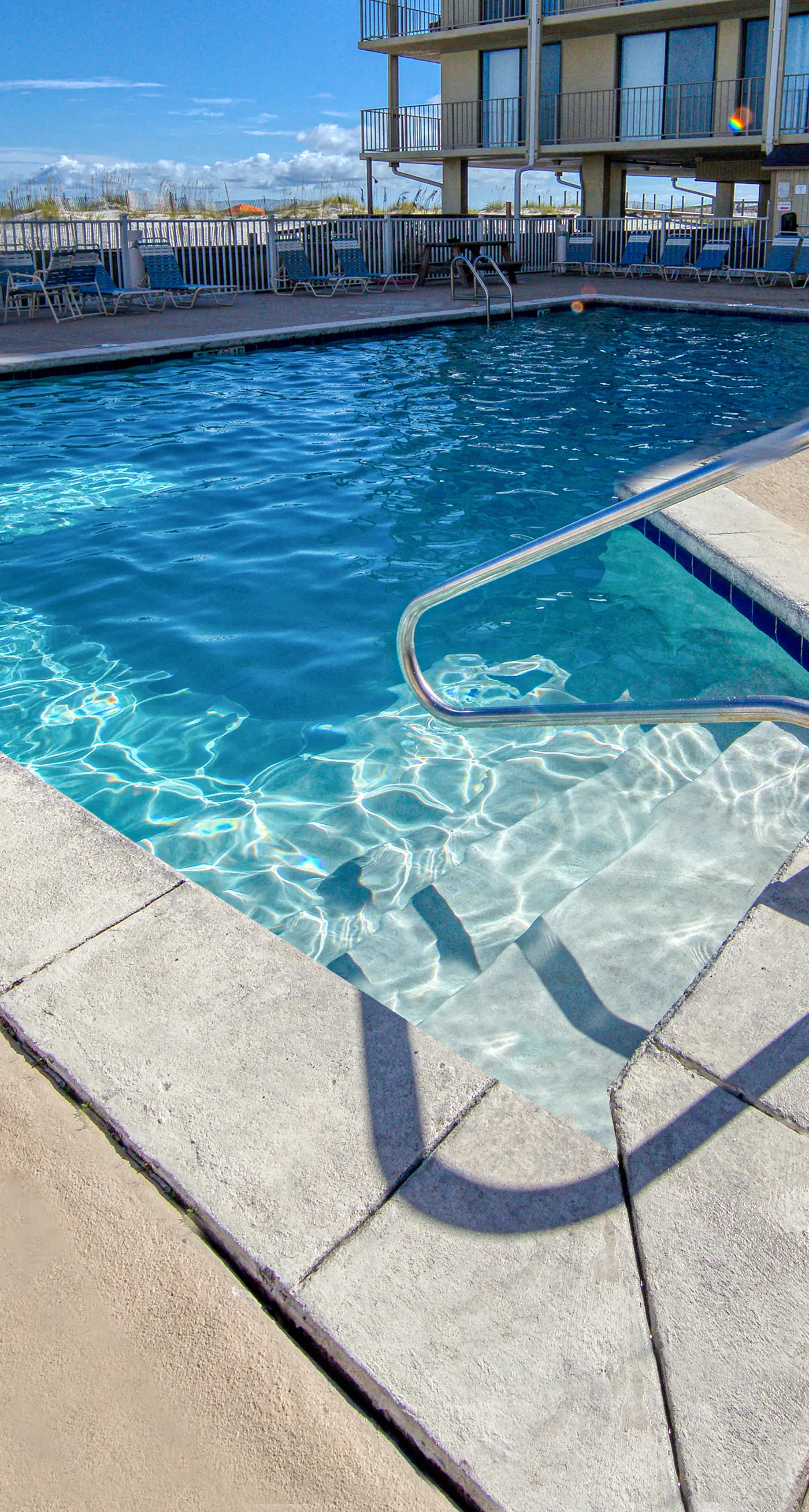 Beachfront condo with Gulf views, outdoor pool, large wrap-around balcony, & W&D