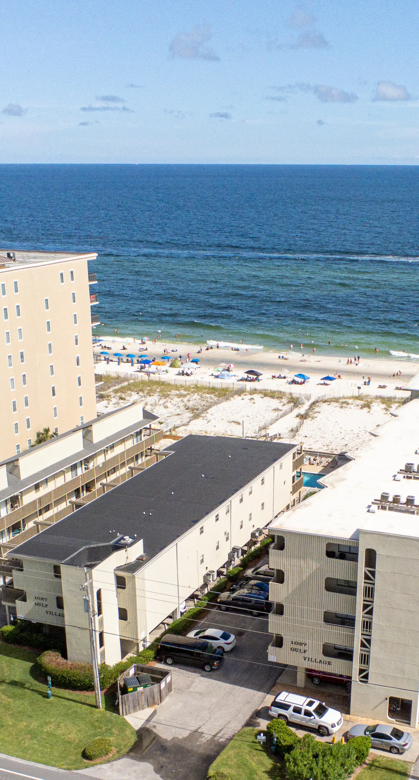 Beachfront condo with Gulf views, outdoor pool, large wrap-around balcony, & W&D