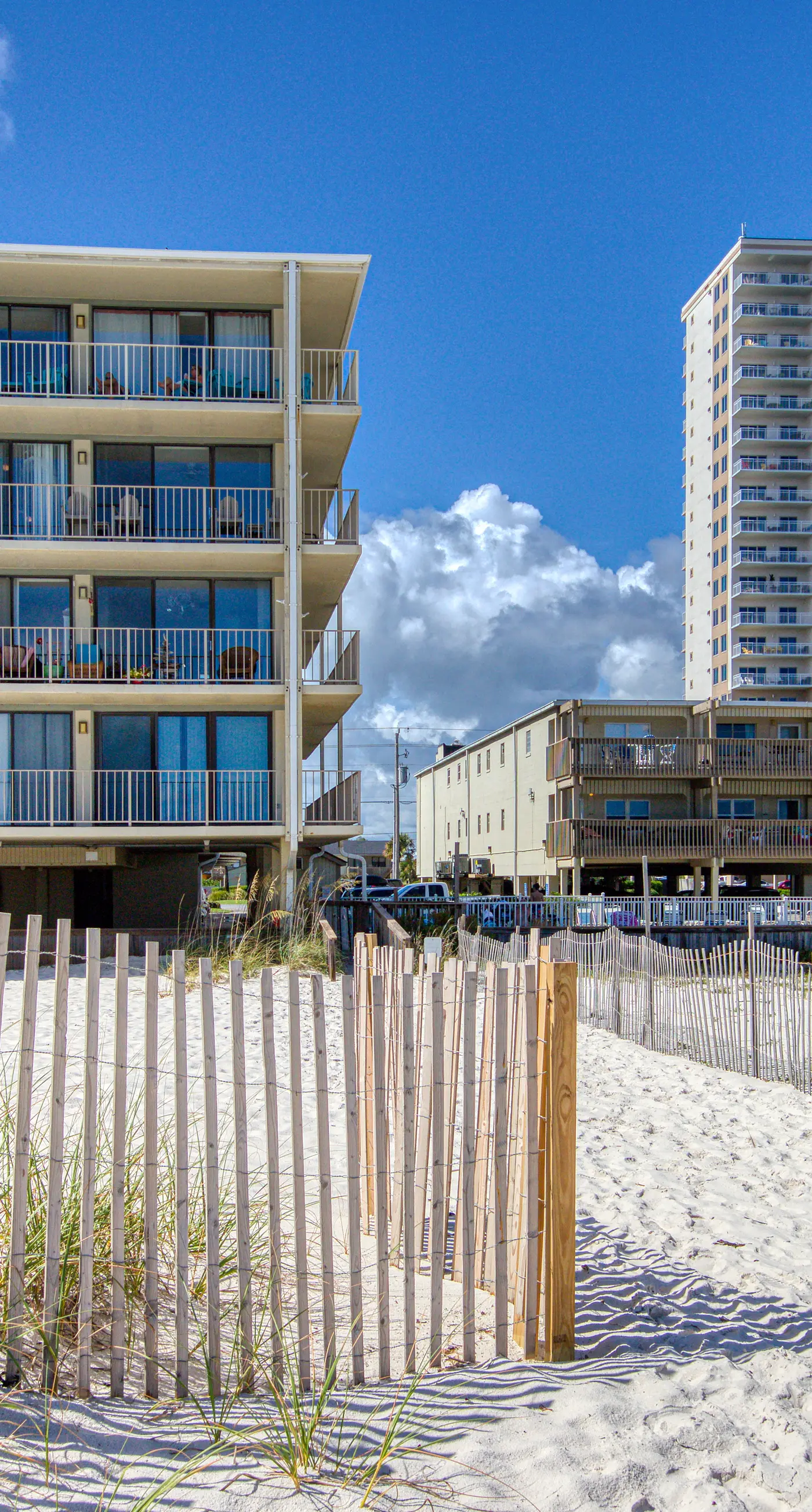 Beachfront condo with Gulf views, outdoor pool, large wrap-around balcony, & W&D