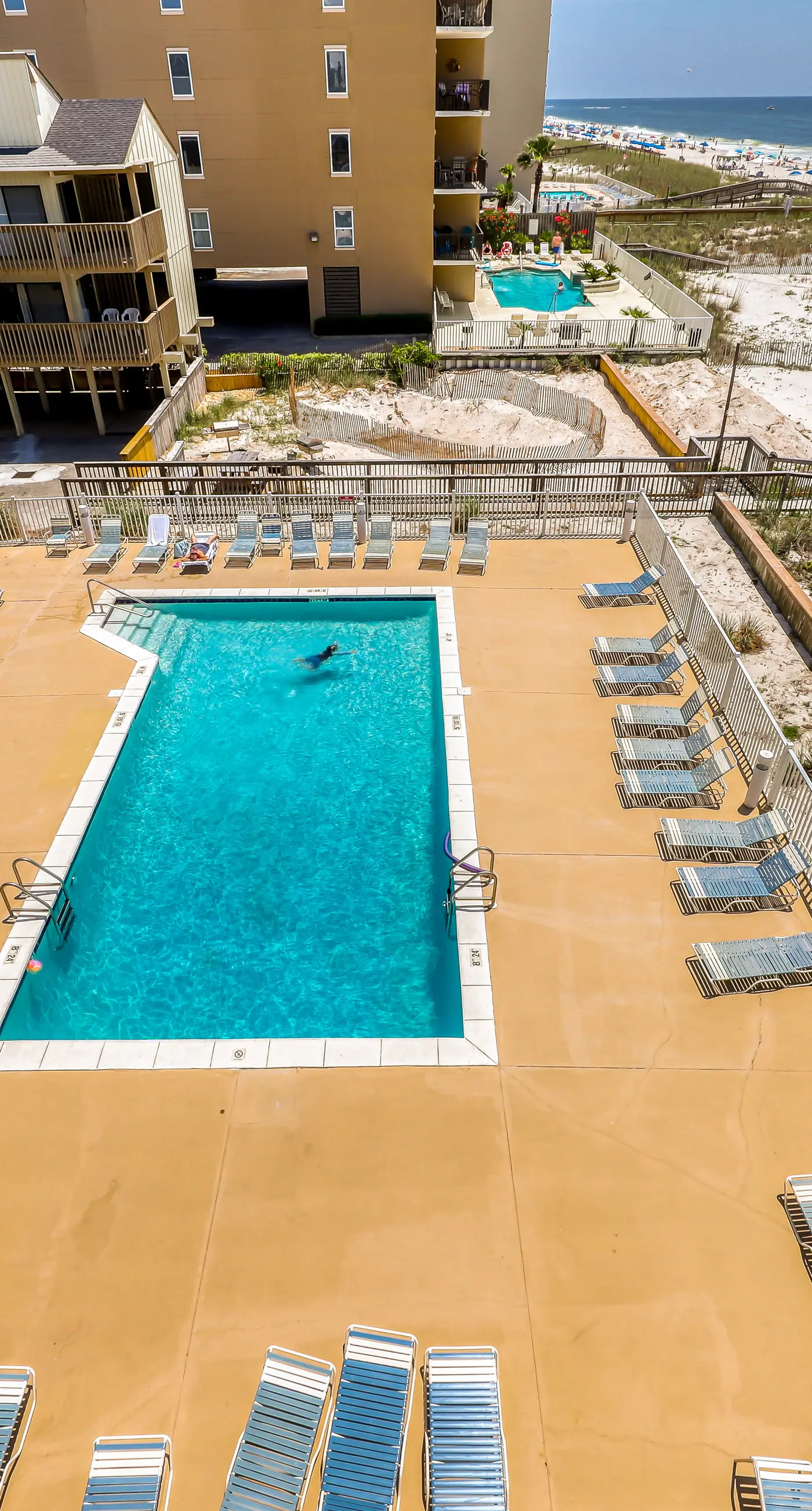Beachfront condo with Gulf views, outdoor pool, large wrap-around balcony, & W&D