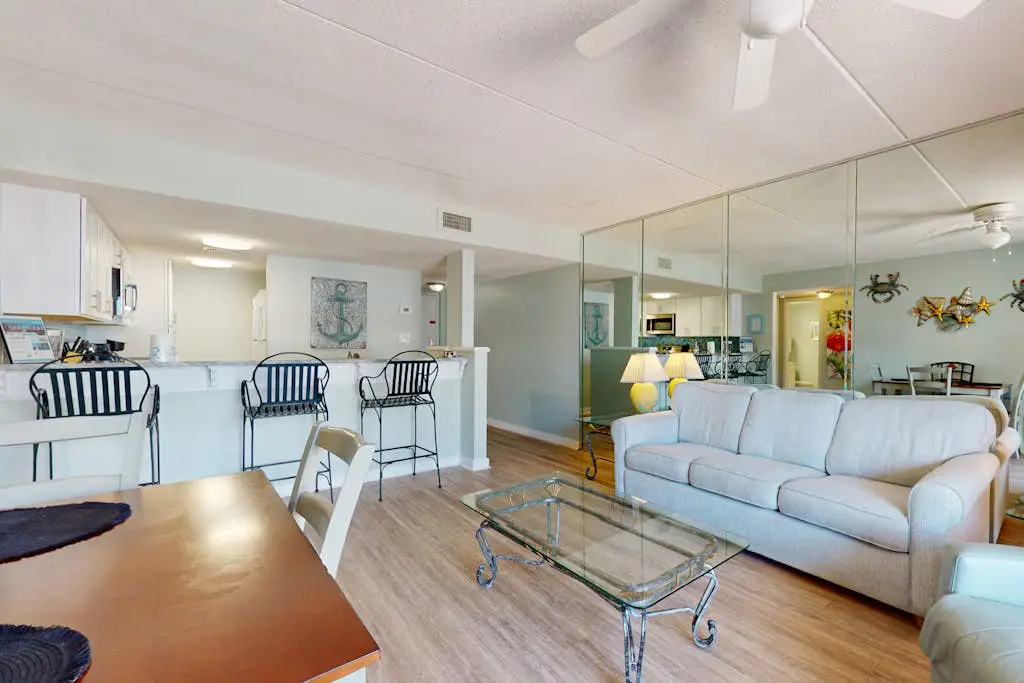 Beachfront condo with Gulf views, outdoor pool, large wrap-around balcony, & W&D