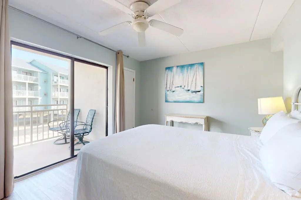 Beachfront condo with Gulf views, outdoor pool, large wrap-around balcony, & W&D