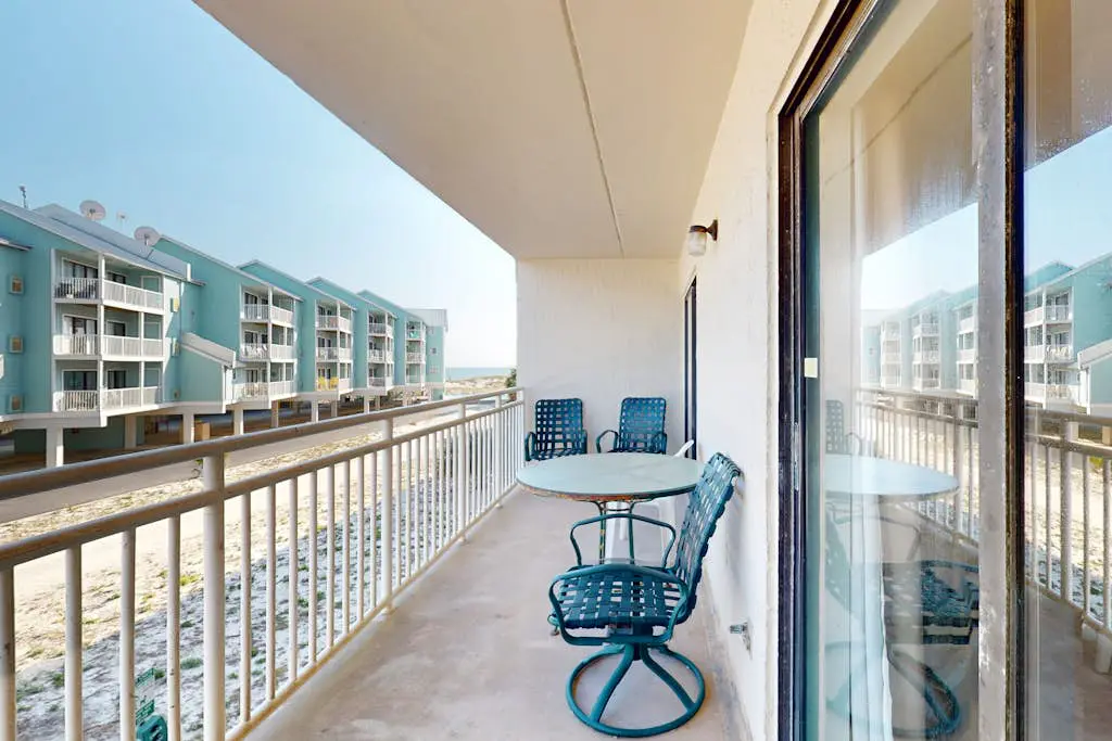 Beachfront condo with Gulf views, outdoor pool, large wrap-around balcony, & W&D