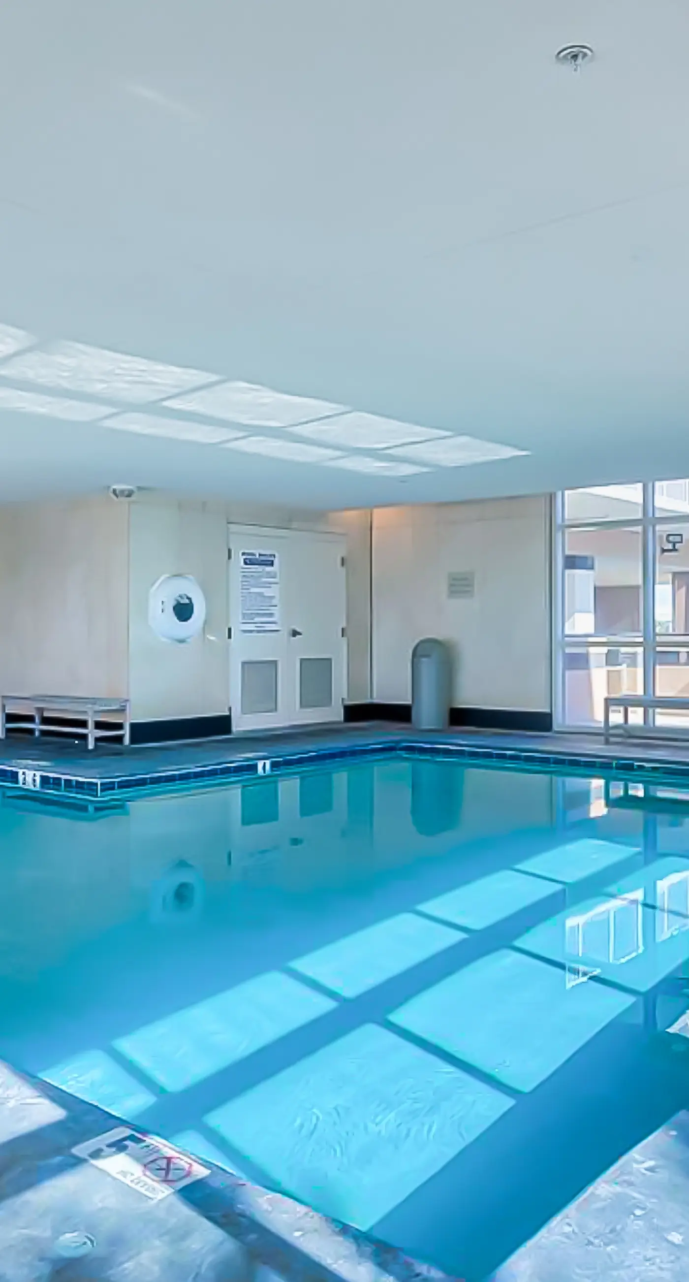 Beachview condo with shared indoor and outdoor pool, beach acces, and WIFI