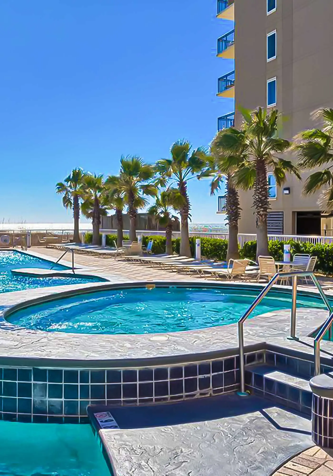 Beachview condo with shared indoor and outdoor pool, beach acces, and WIFI