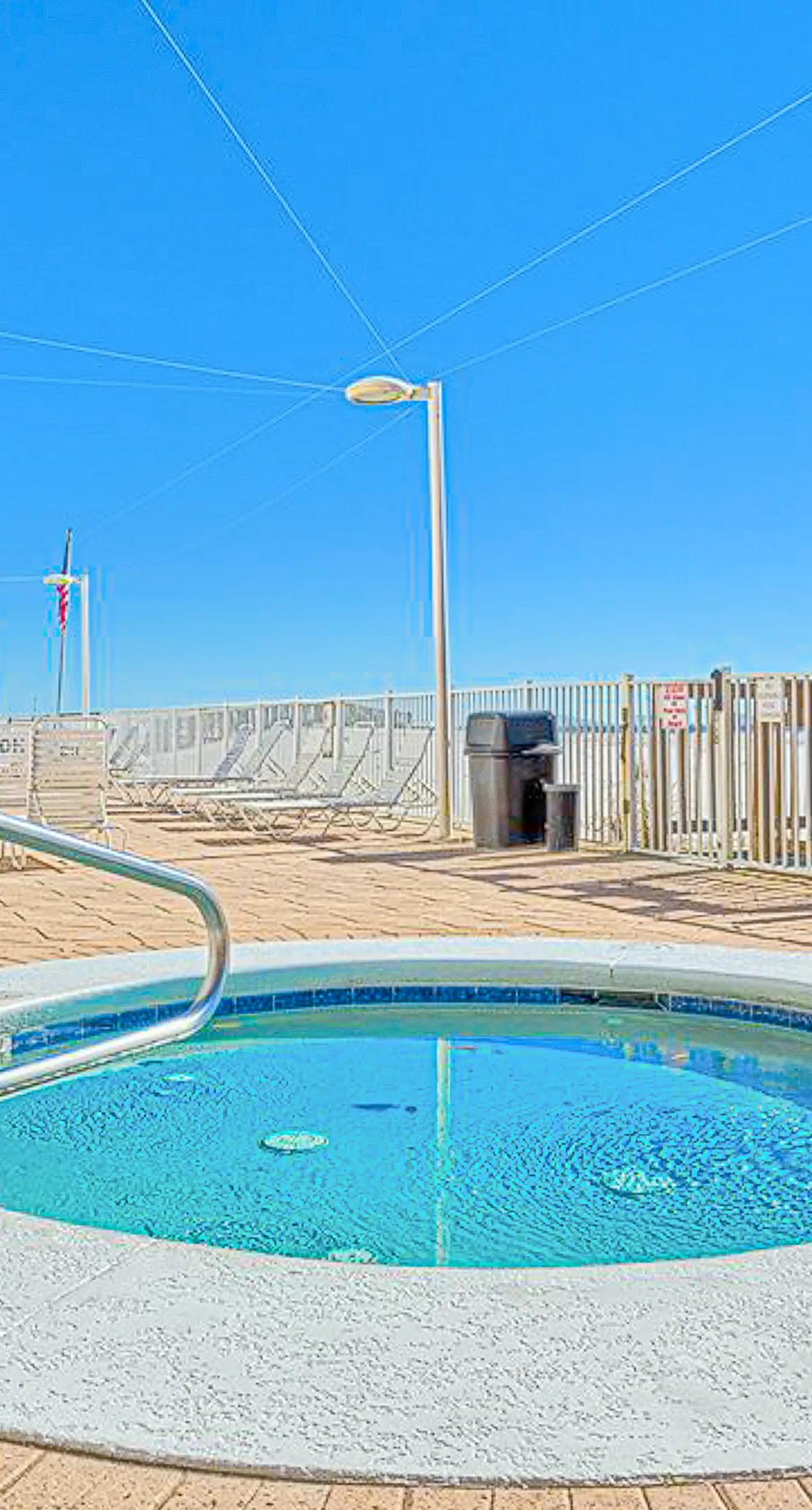 Beachfront condo with private balcony, outdoor pool, direct beach access & views