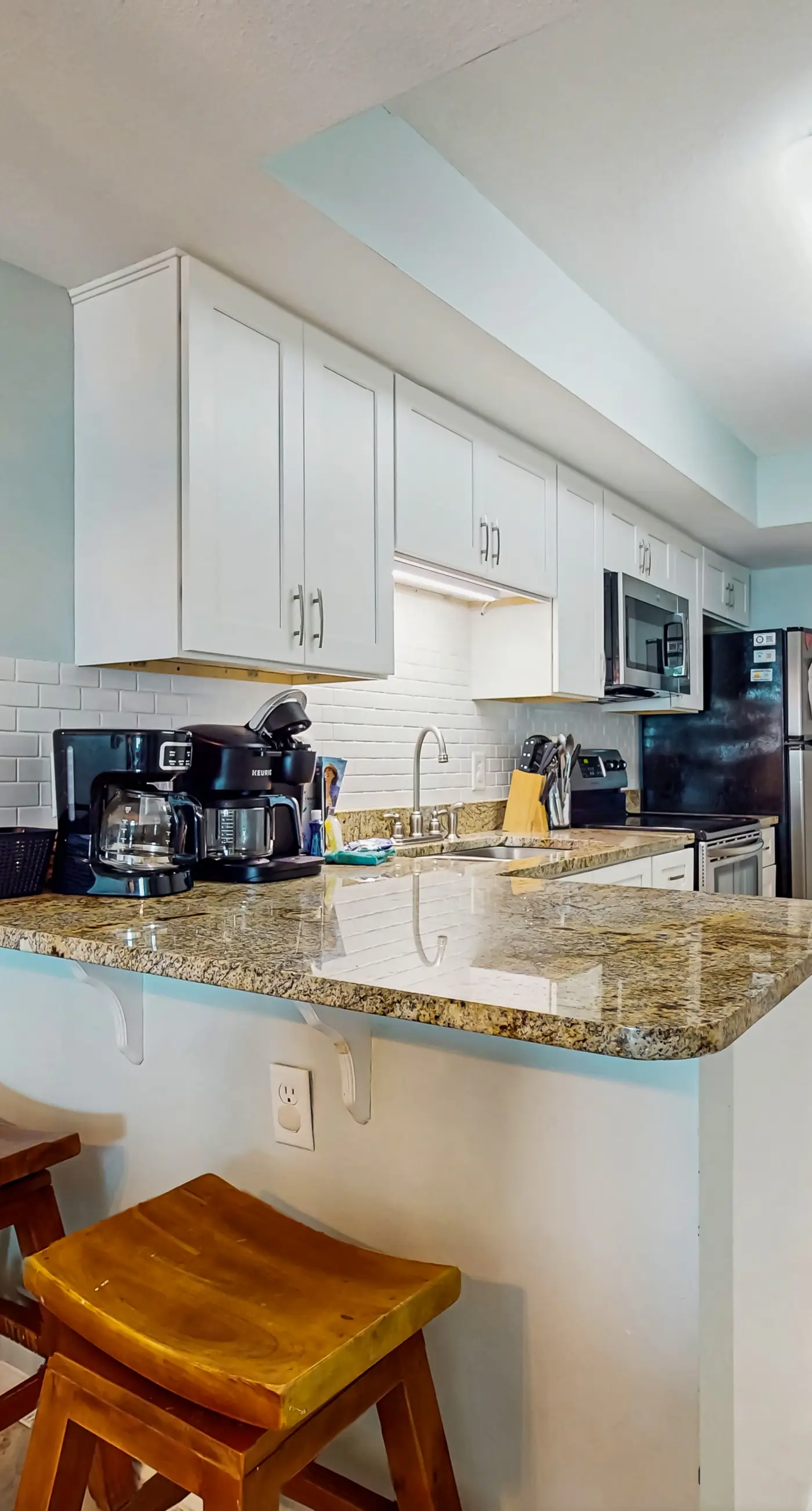 Beachfront condo with private balcony, outdoor pool, direct beach access & views