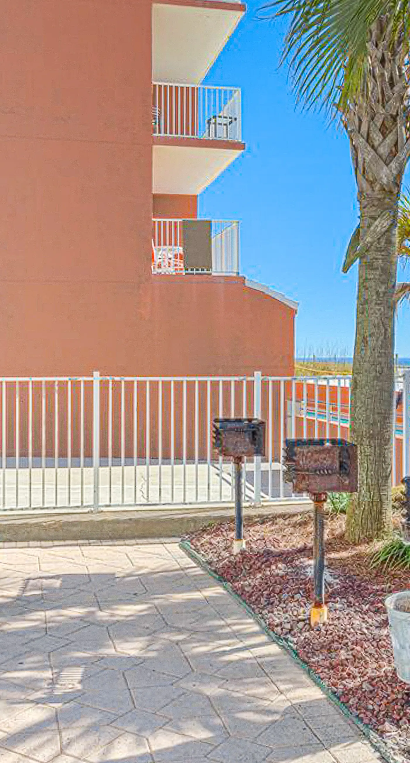 Beachfront condo with private balcony, outdoor pool, direct beach access & views