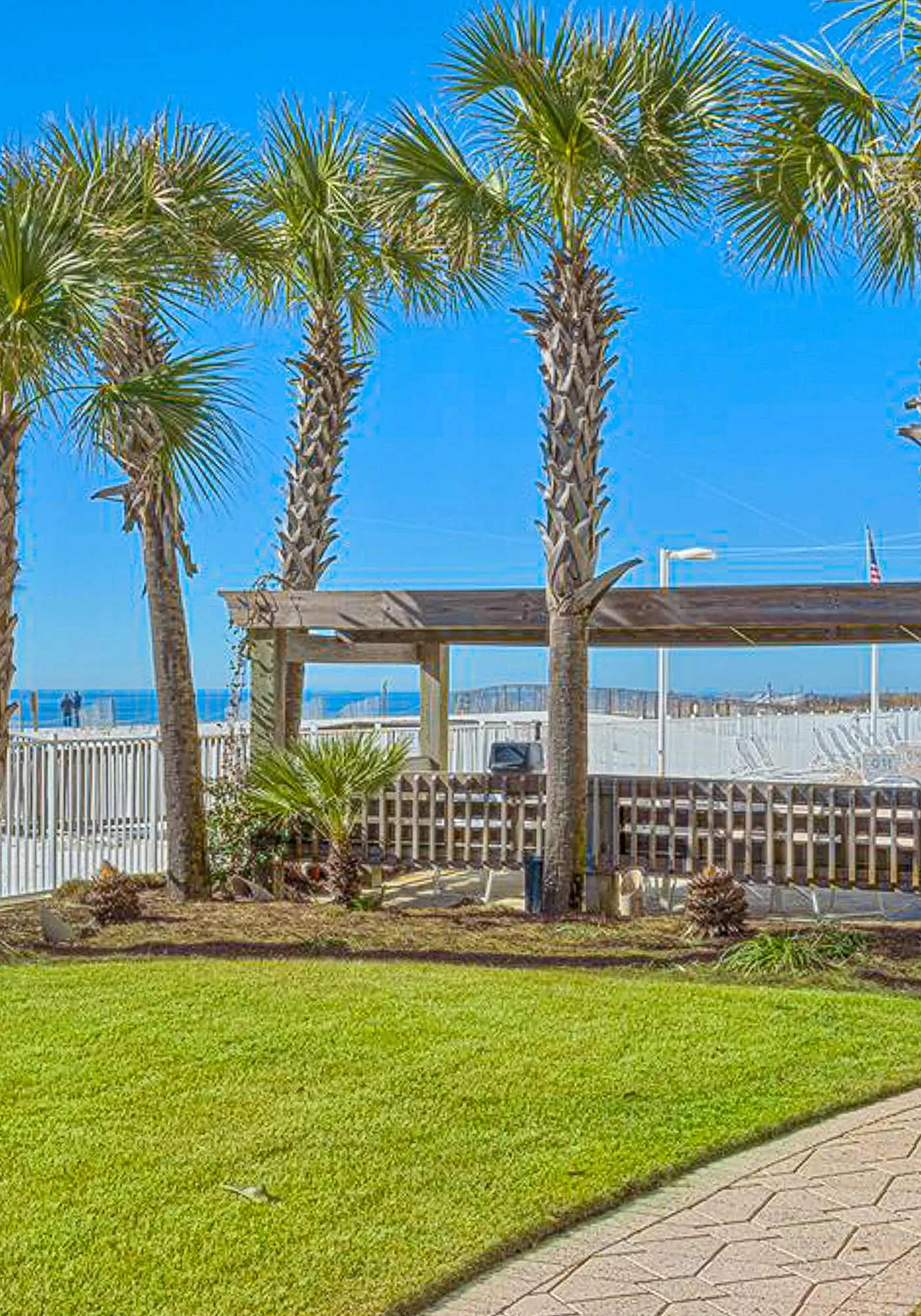 Beachfront condo with private balcony, outdoor pool, direct beach access & views