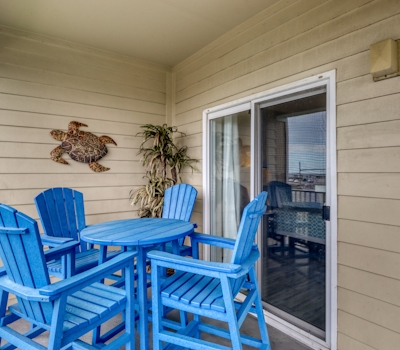 Second floor condo with Gulf view, shared pool, central AC, & BBQ area