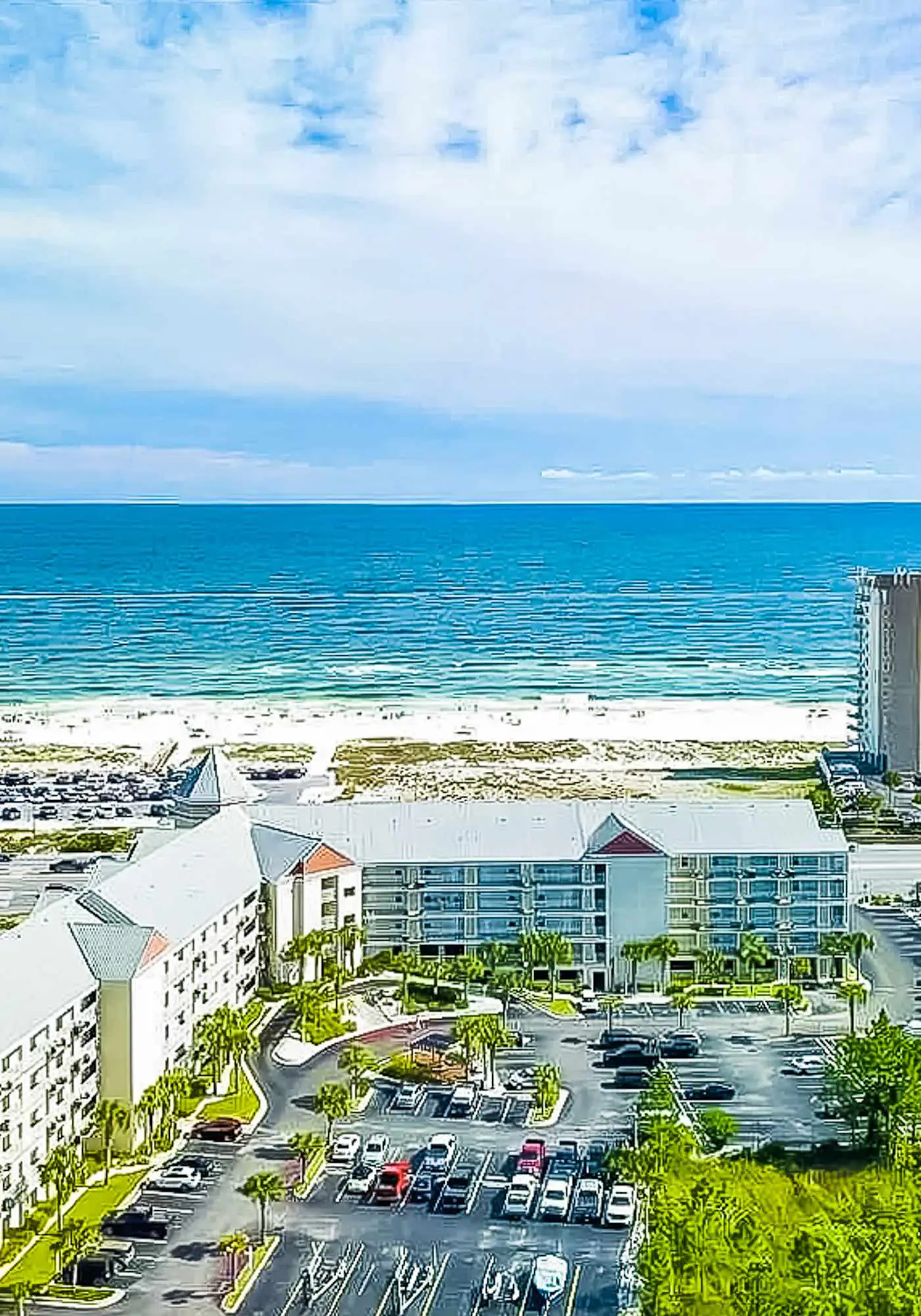 Second floor condo with Gulf view, shared pool, central AC, & BBQ area