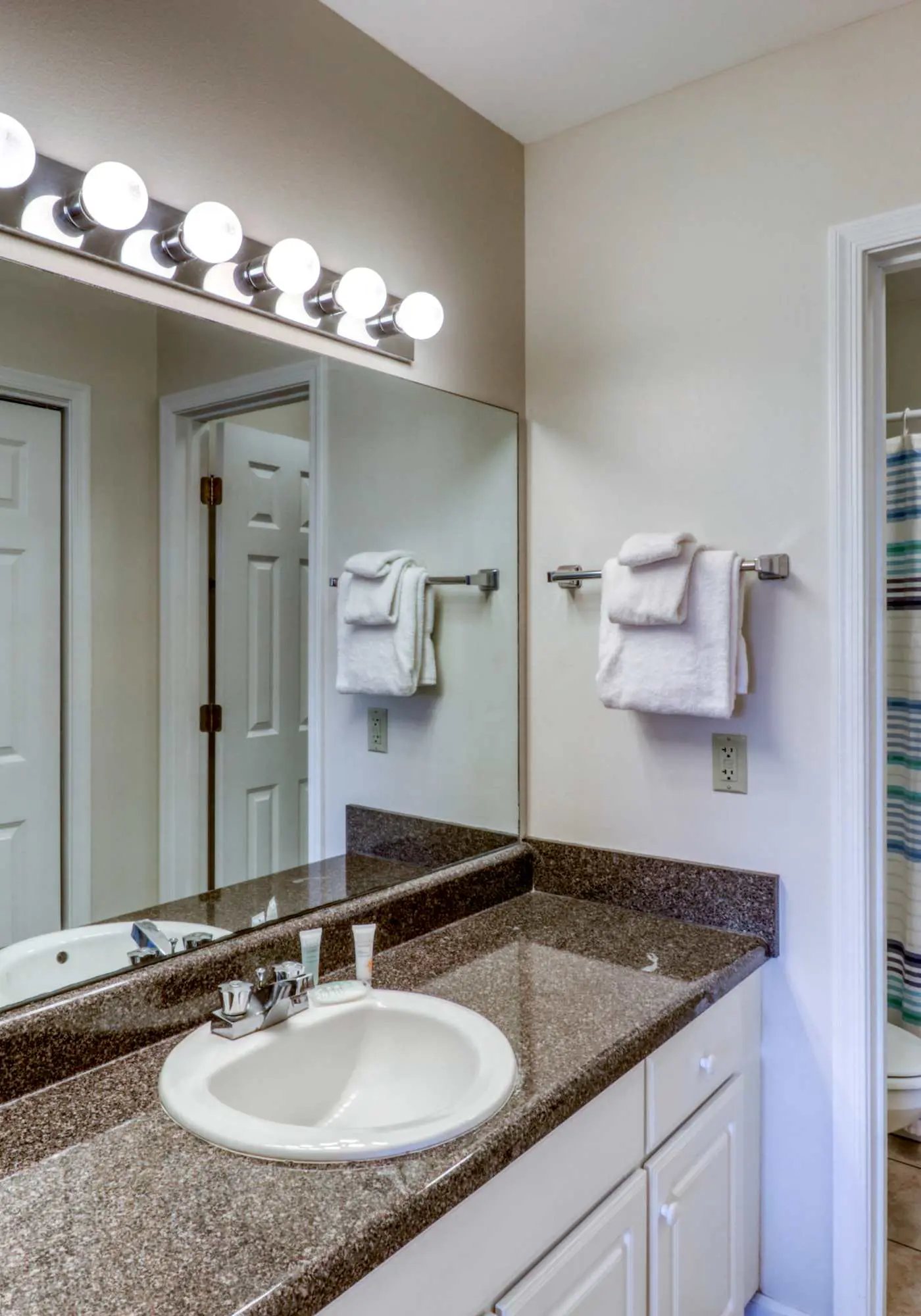 Second floor condo with Gulf view, shared pool, central AC, & BBQ area