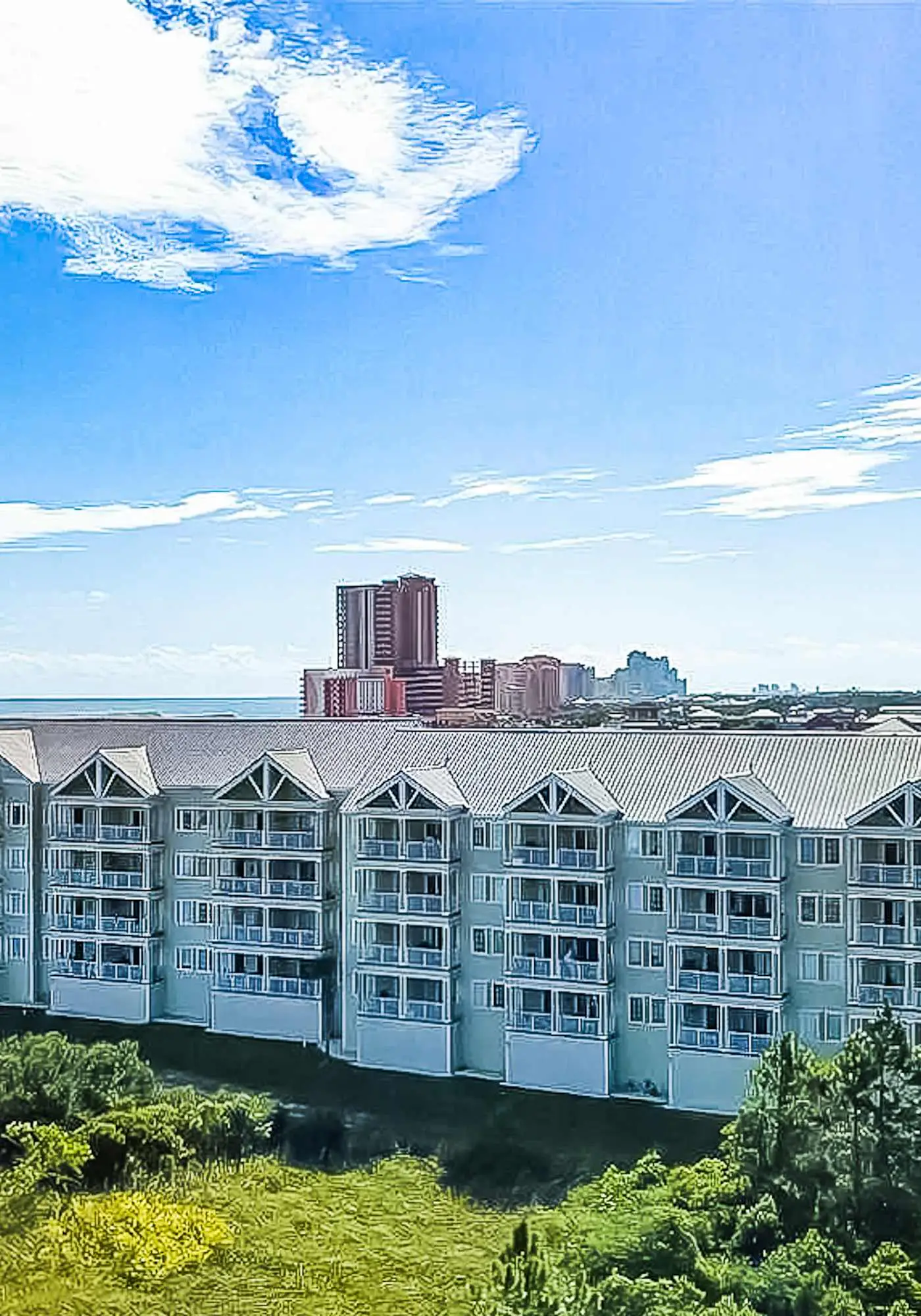 Second floor condo with Gulf view, shared pool, central AC, & BBQ area