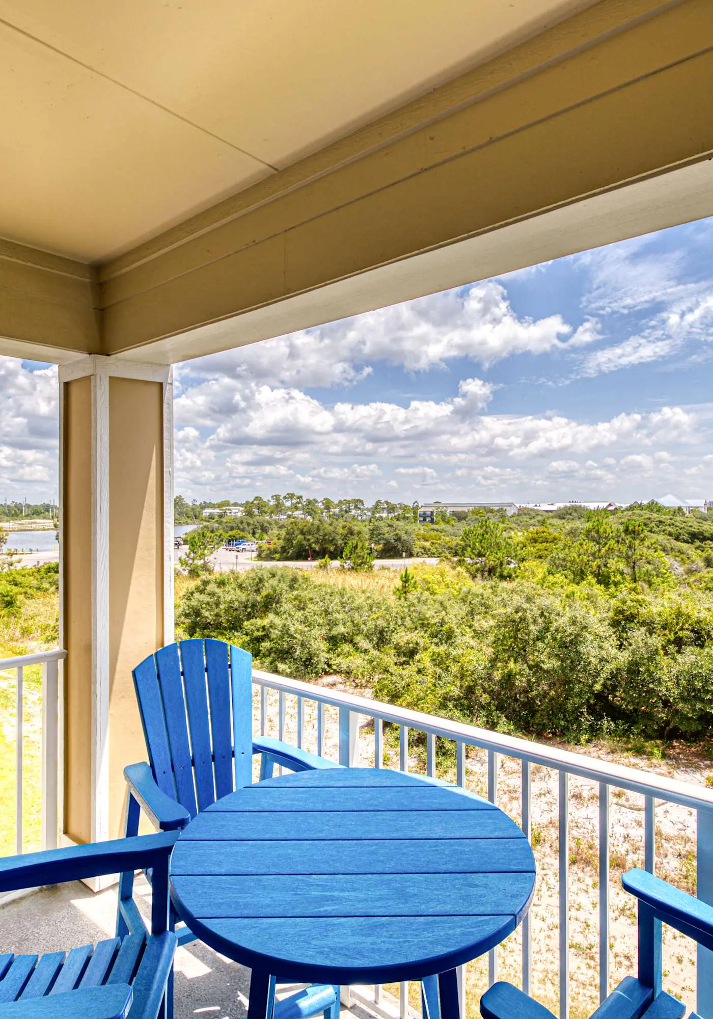 Second floor condo with Gulf view, shared pool, central AC, & BBQ area