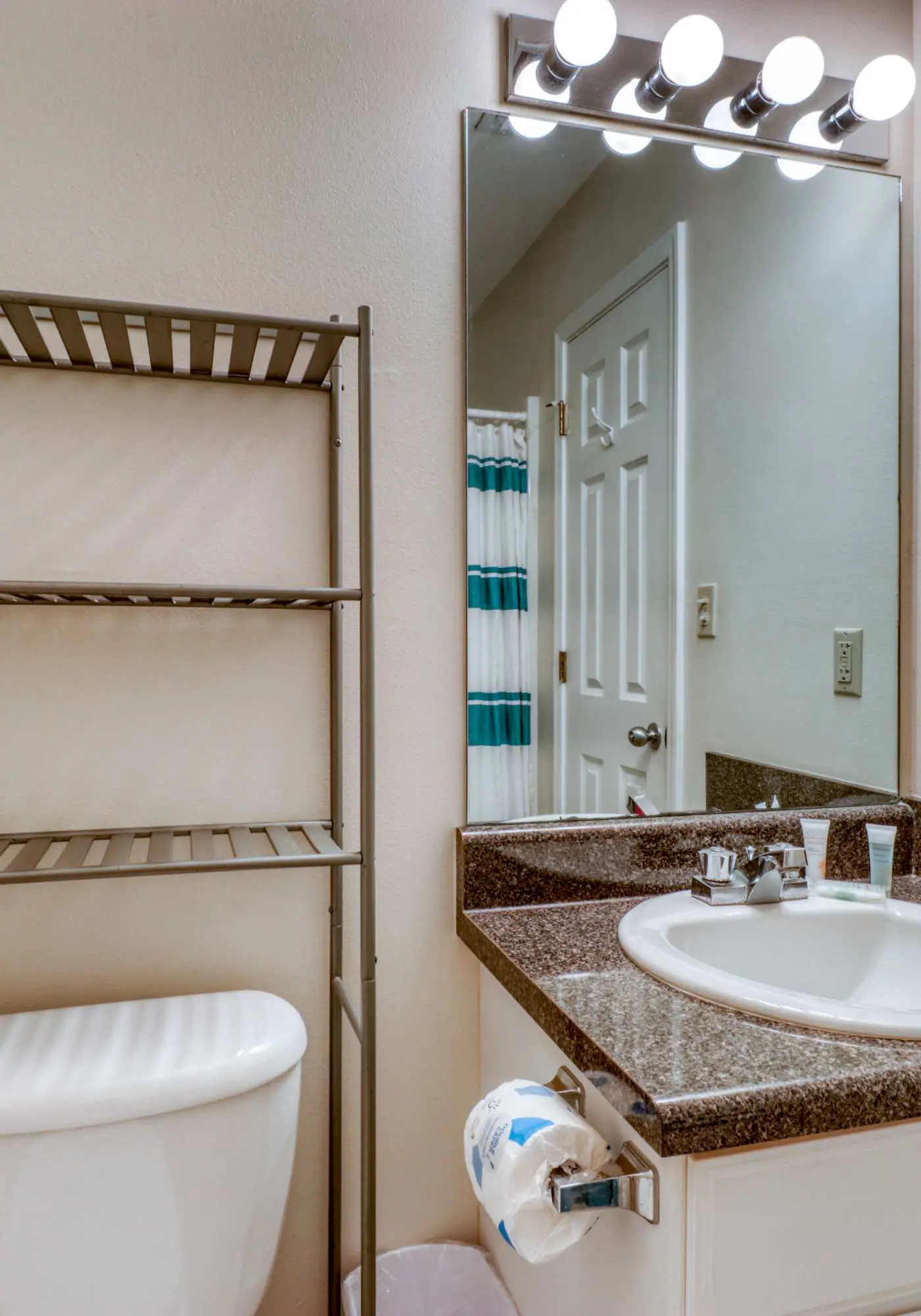 Second floor condo with Gulf view, shared pool, central AC, & BBQ area