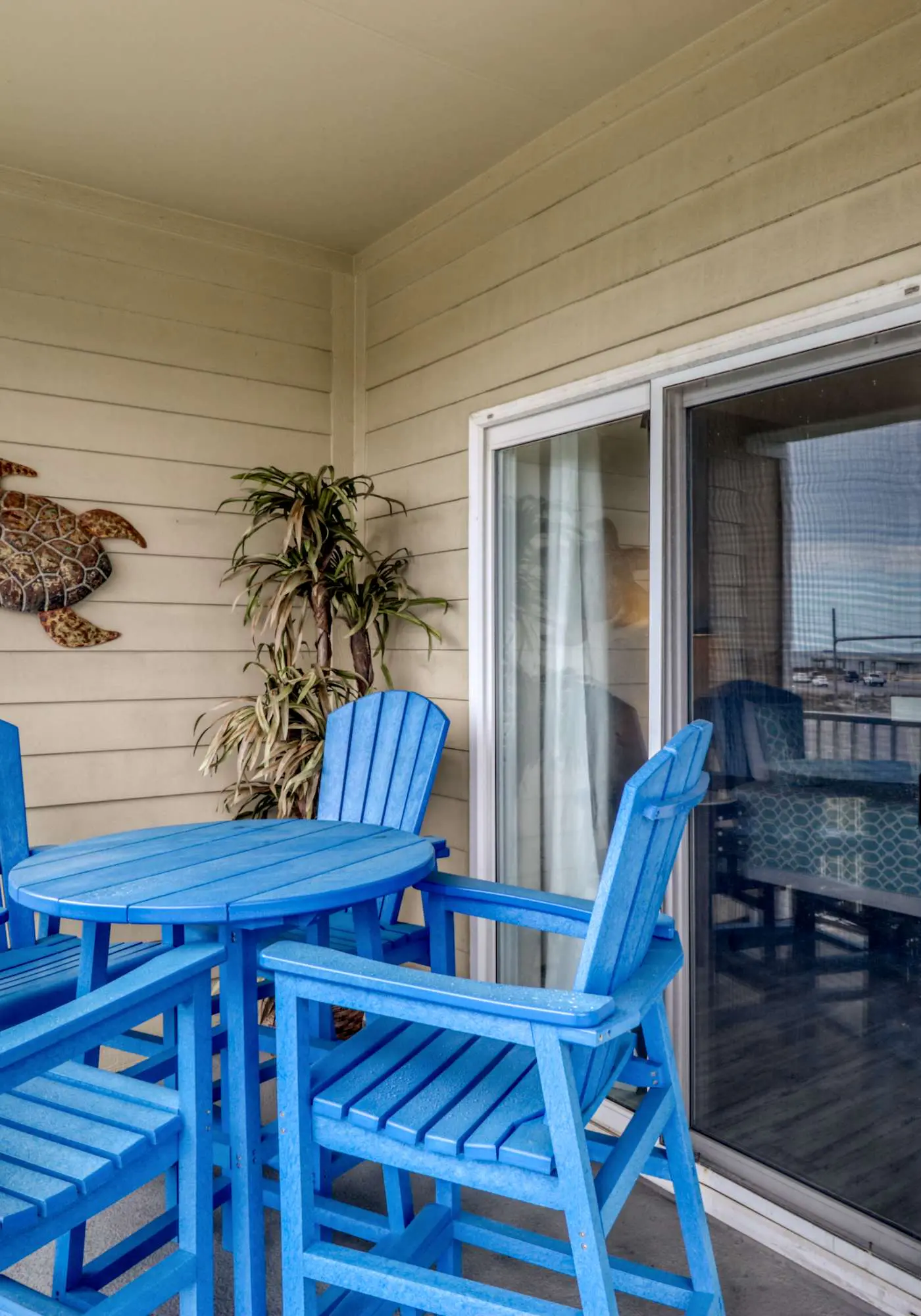 Second floor condo with Gulf view, shared pool, central AC, & BBQ area