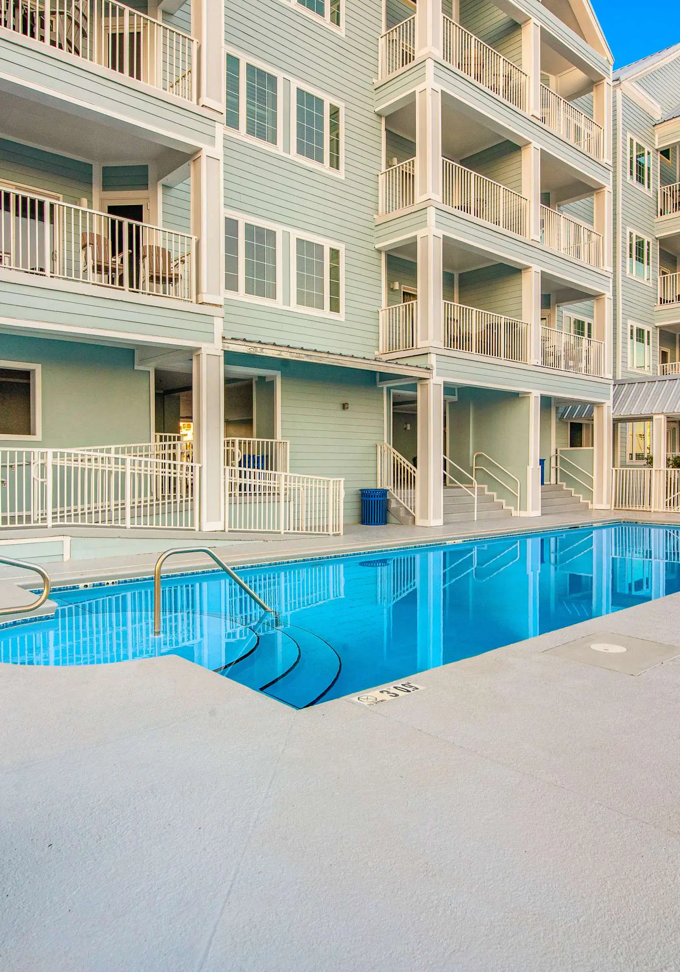 Second floor condo with Gulf view, shared pool, central AC, & BBQ area