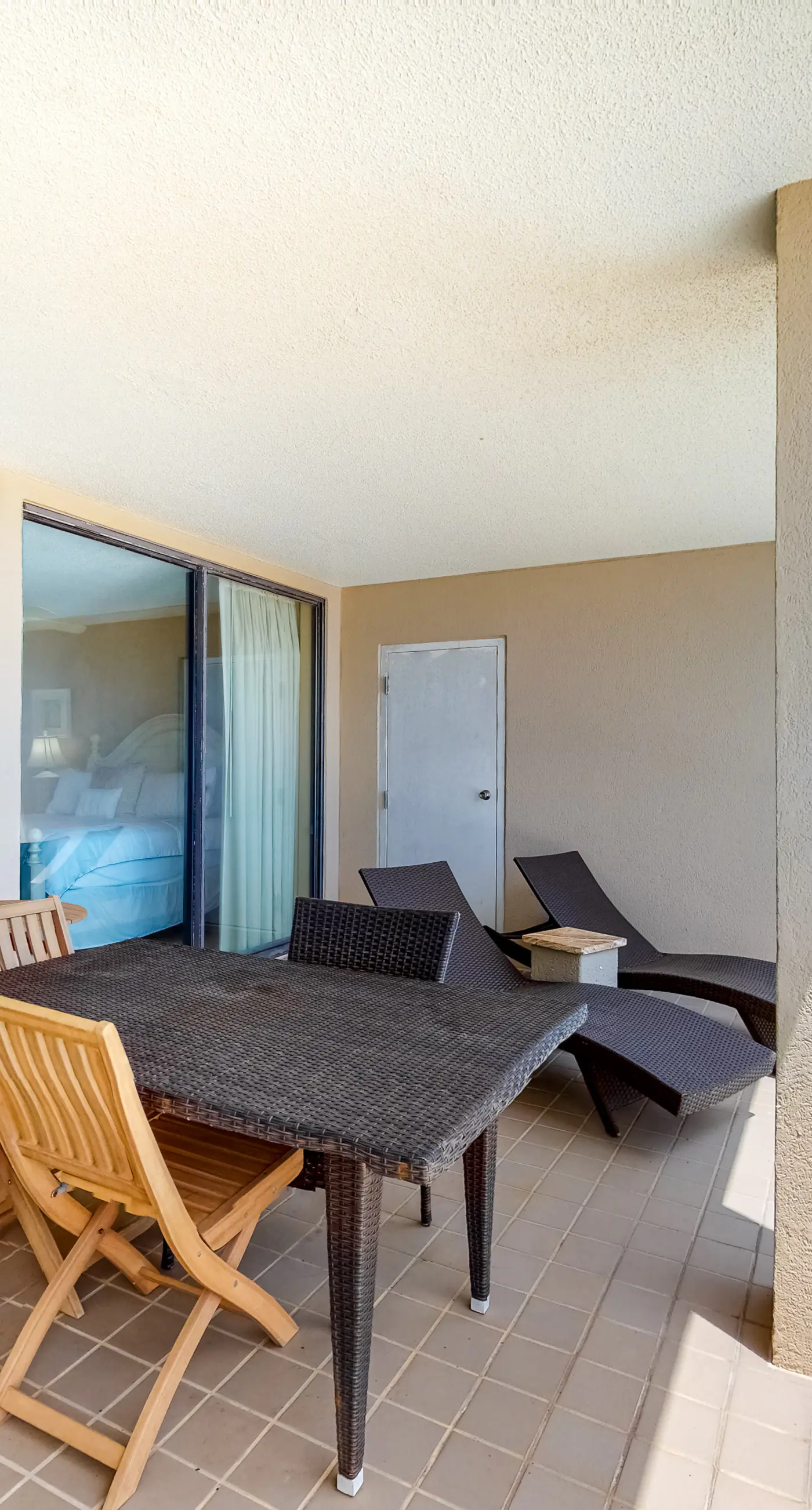 Large beachfront condo with views from private balcony and shared hot tub & pool