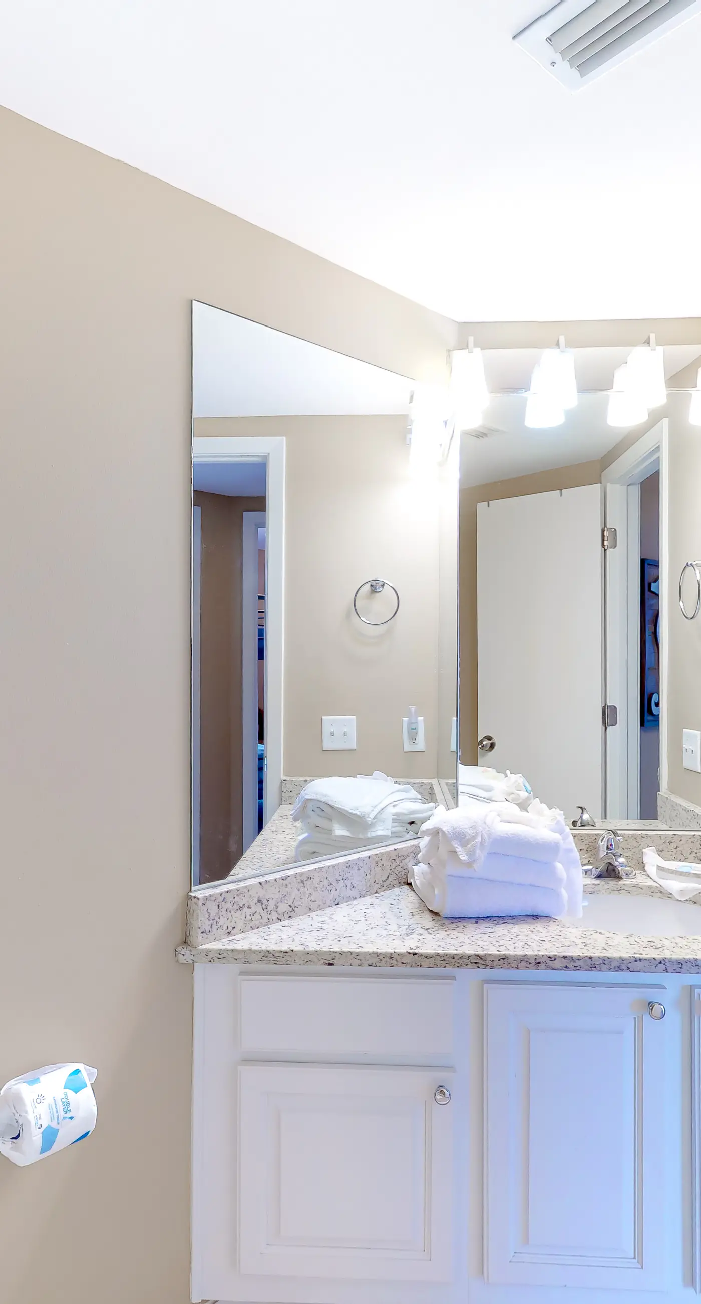 Large beachfront condo with views from private balcony and shared hot tub & pool