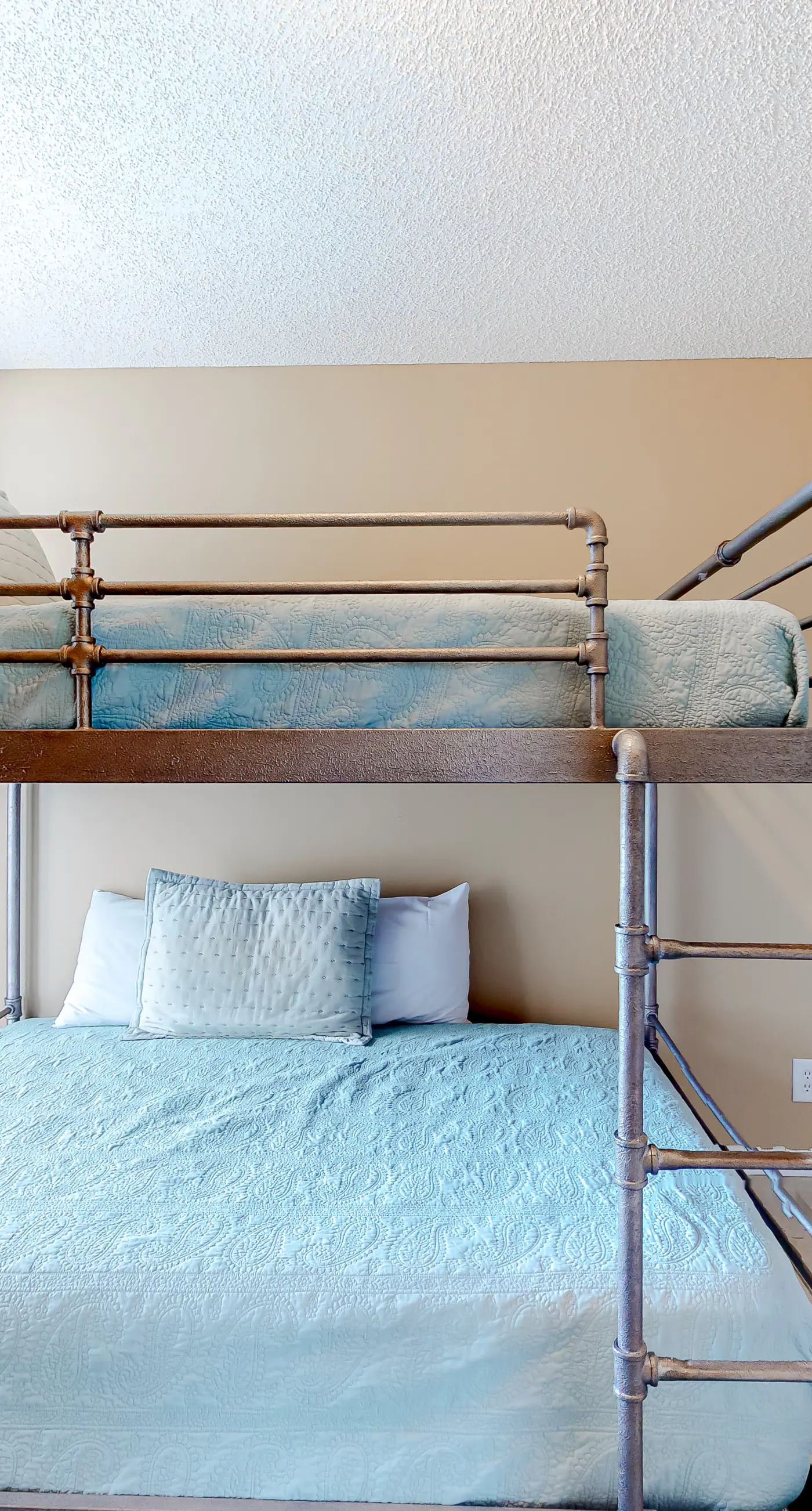 Large beachfront condo with views from private balcony and shared hot tub & pool