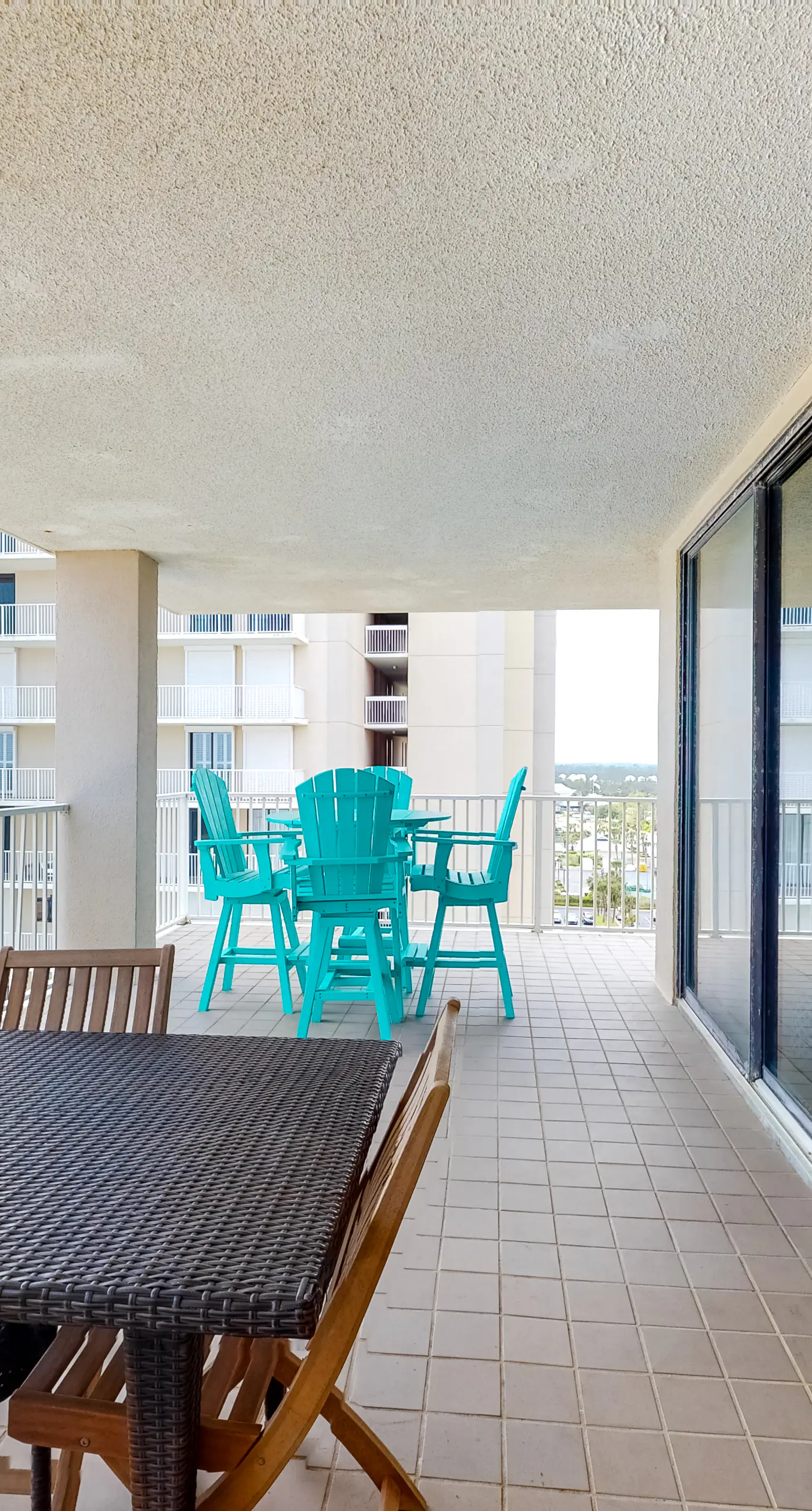 Large beachfront condo with views from private balcony and shared hot tub & pool