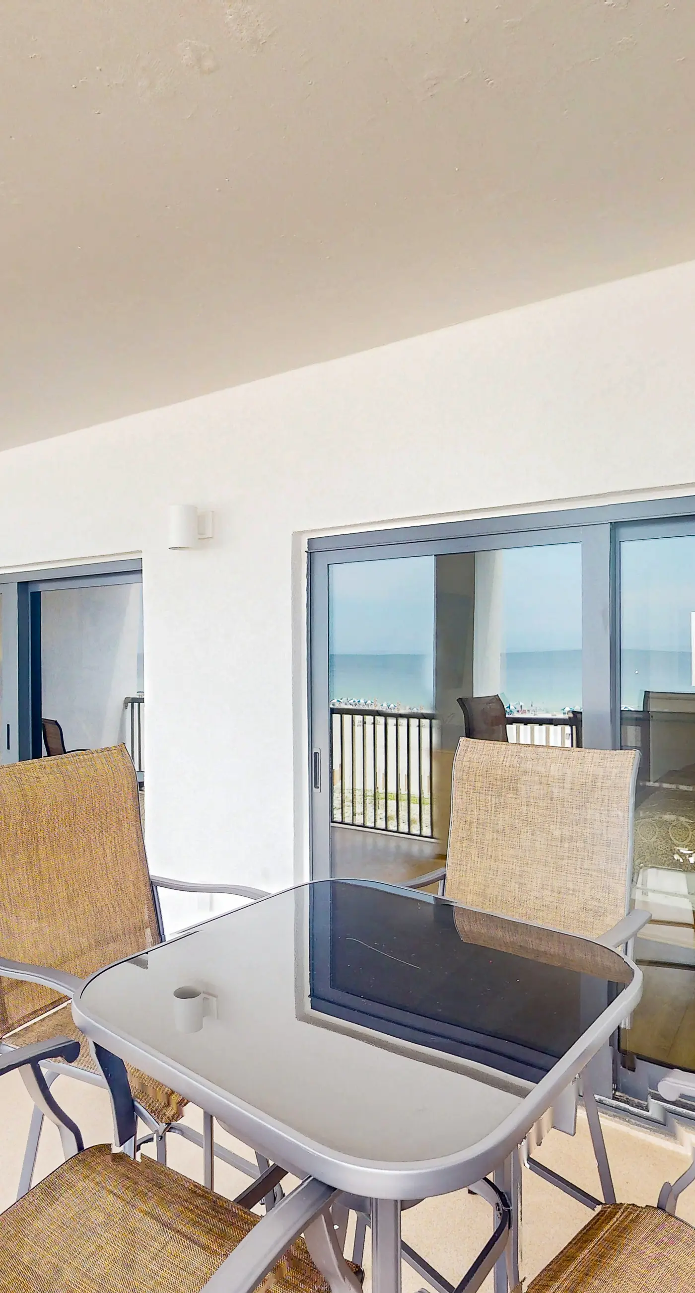 Beachfront condo with shared Gulf front outdoor pool, heated indoor pool, & sauna