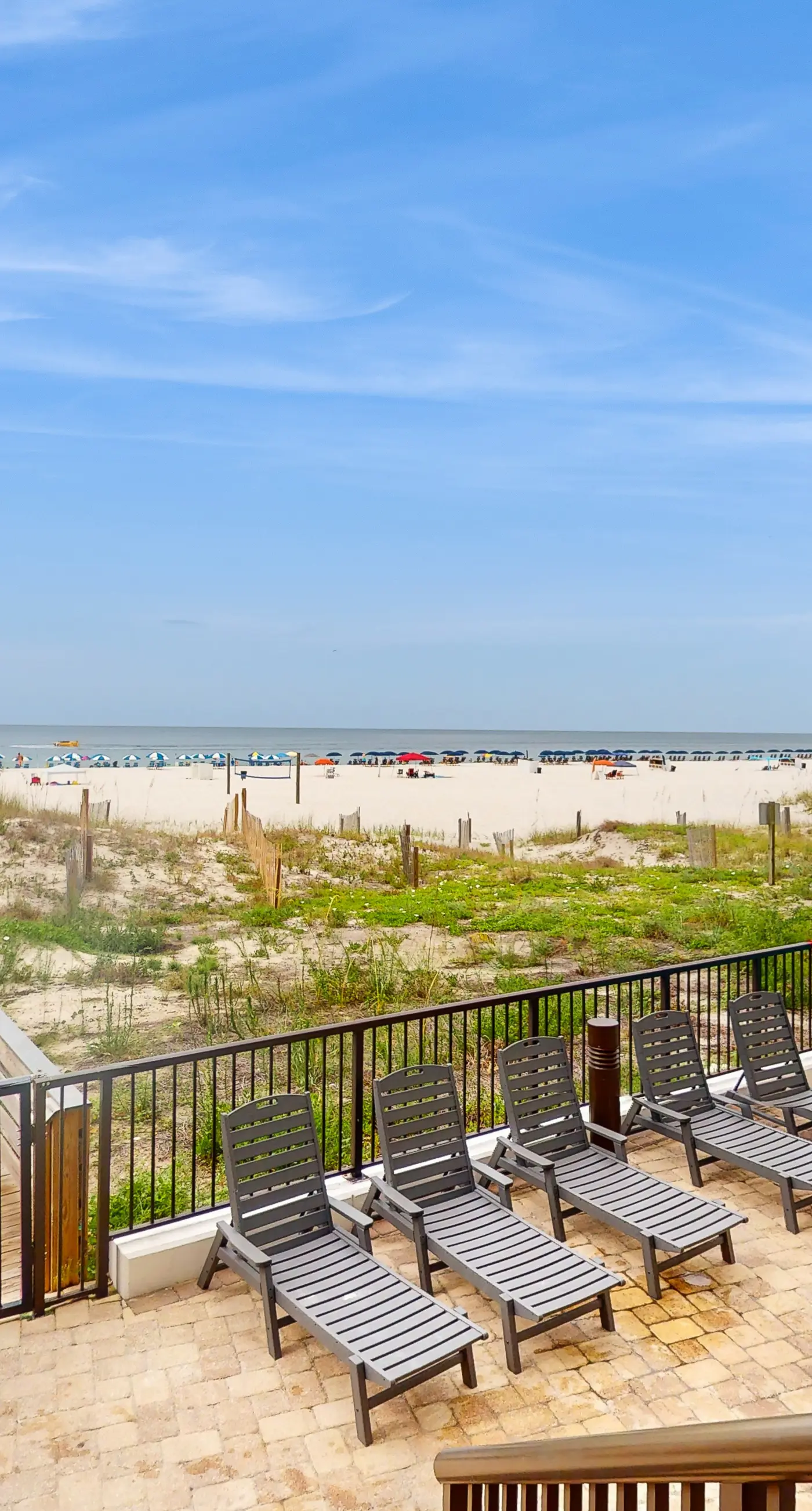 Beachfront condo with shared Gulf front outdoor pool, heated indoor pool, & sauna