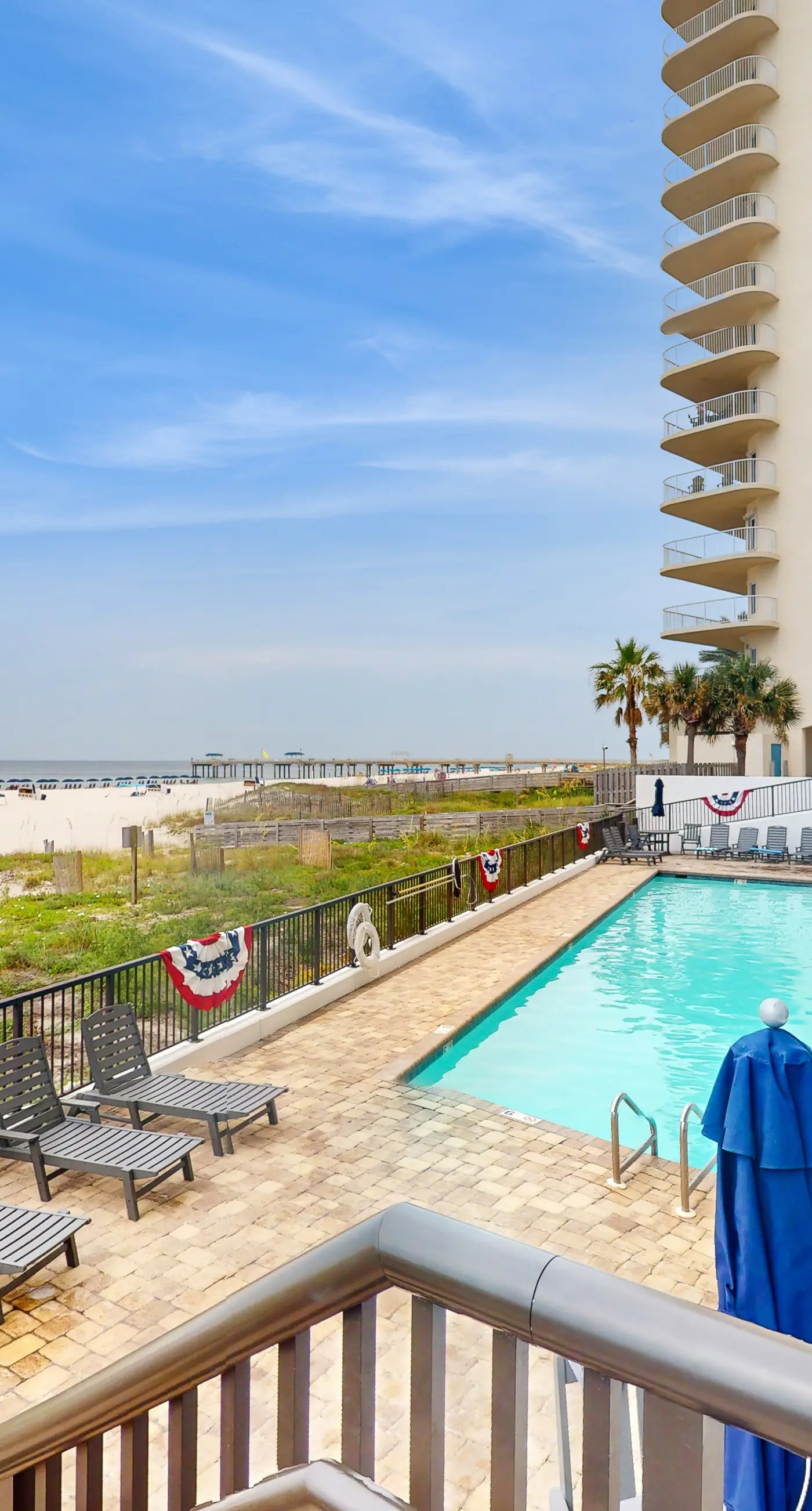 Beachfront condo with shared Gulf front outdoor pool, heated indoor pool, & sauna