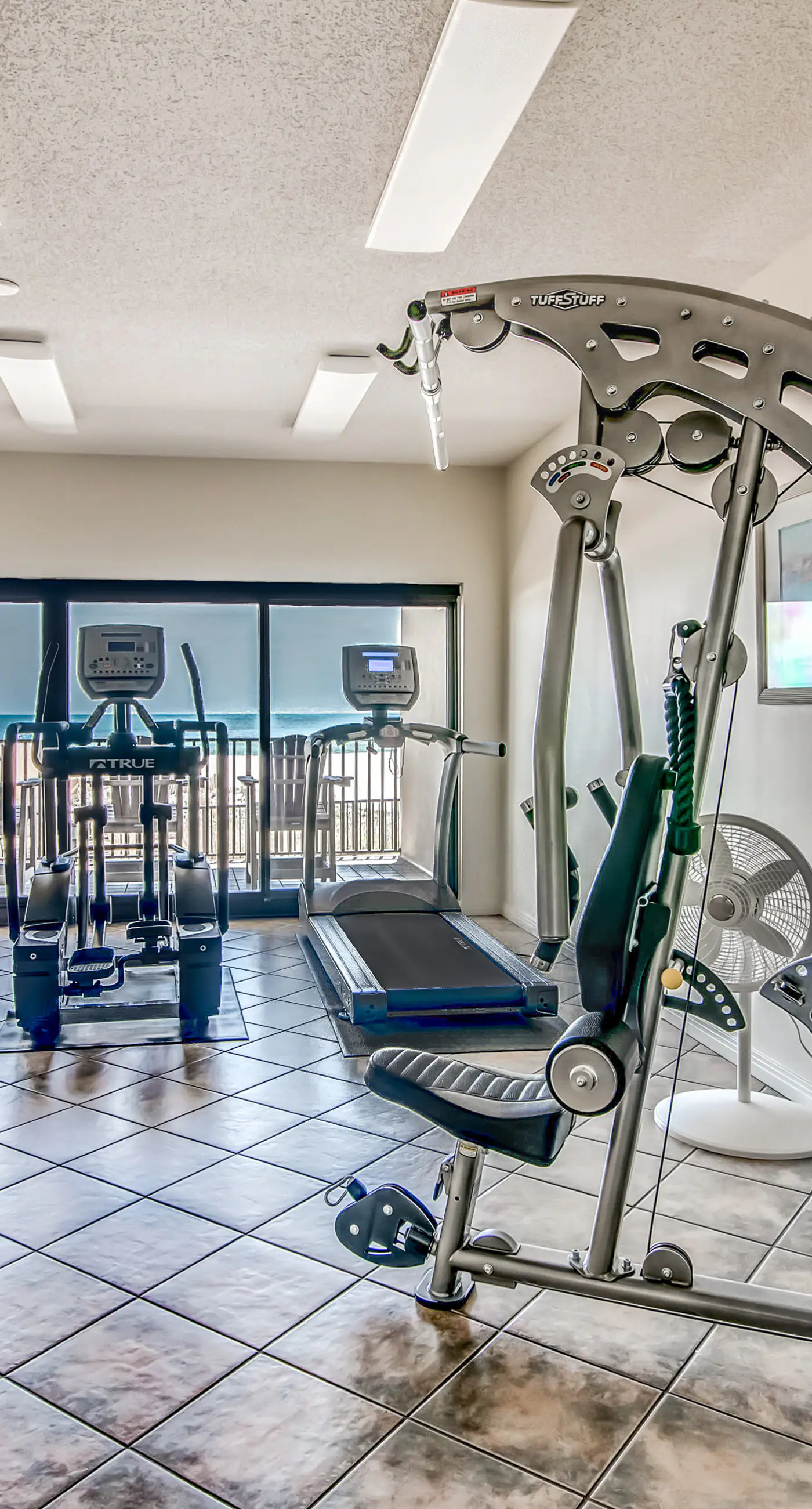 Beachfront condo with shared Gulf front outdoor pool, heated indoor pool, & sauna