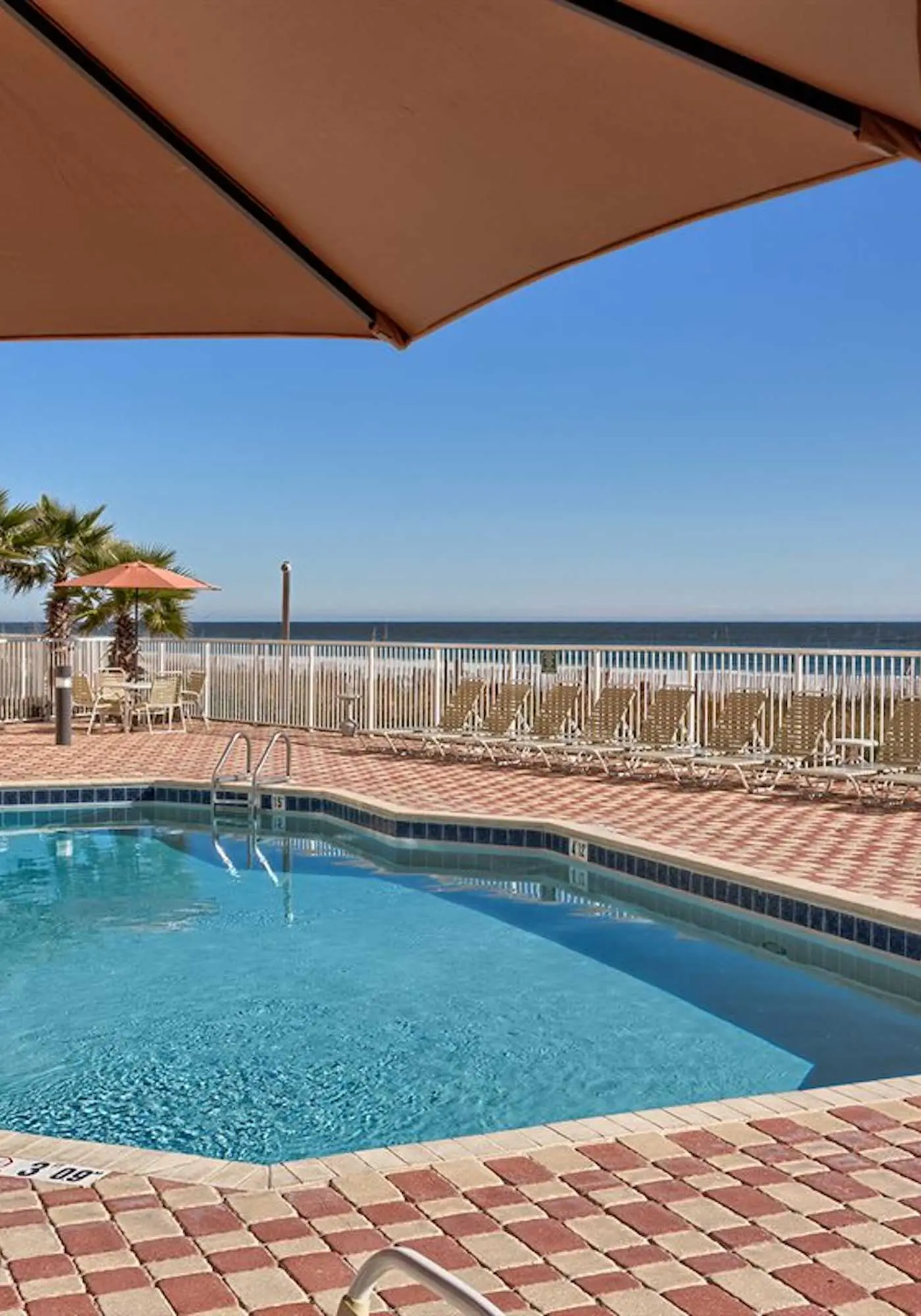 Gulf-front condo w/ beach access, indoor/outdoor pool, & tennis courts