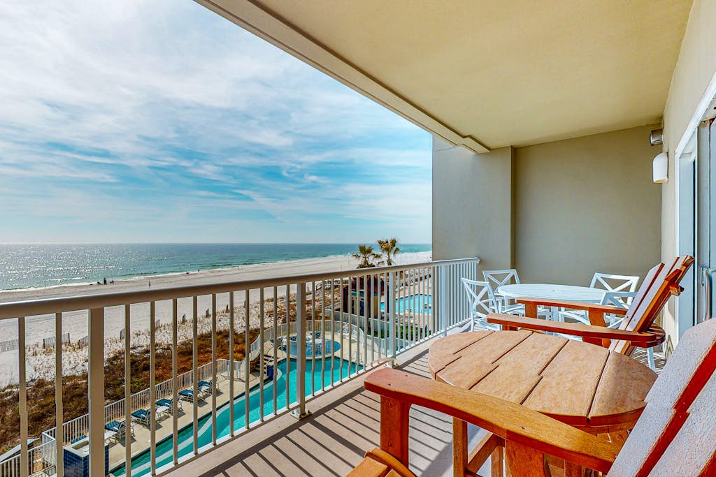 Spacious condo with Gulf-front views & access to pools, hot tub, gym