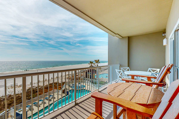 Spacious condo with Gulf-front views & access to pools, hot tub, gym