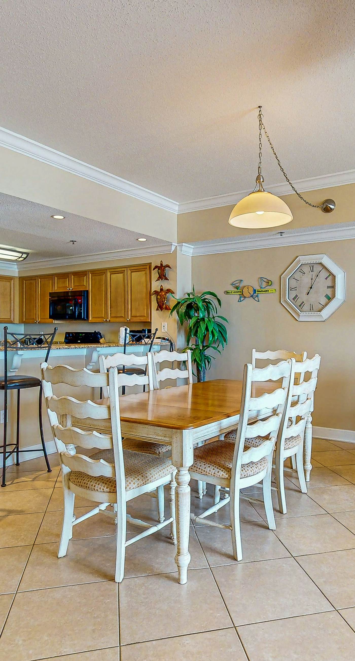 Spacious condo with Gulf-front views & access to pools, hot tub, gym