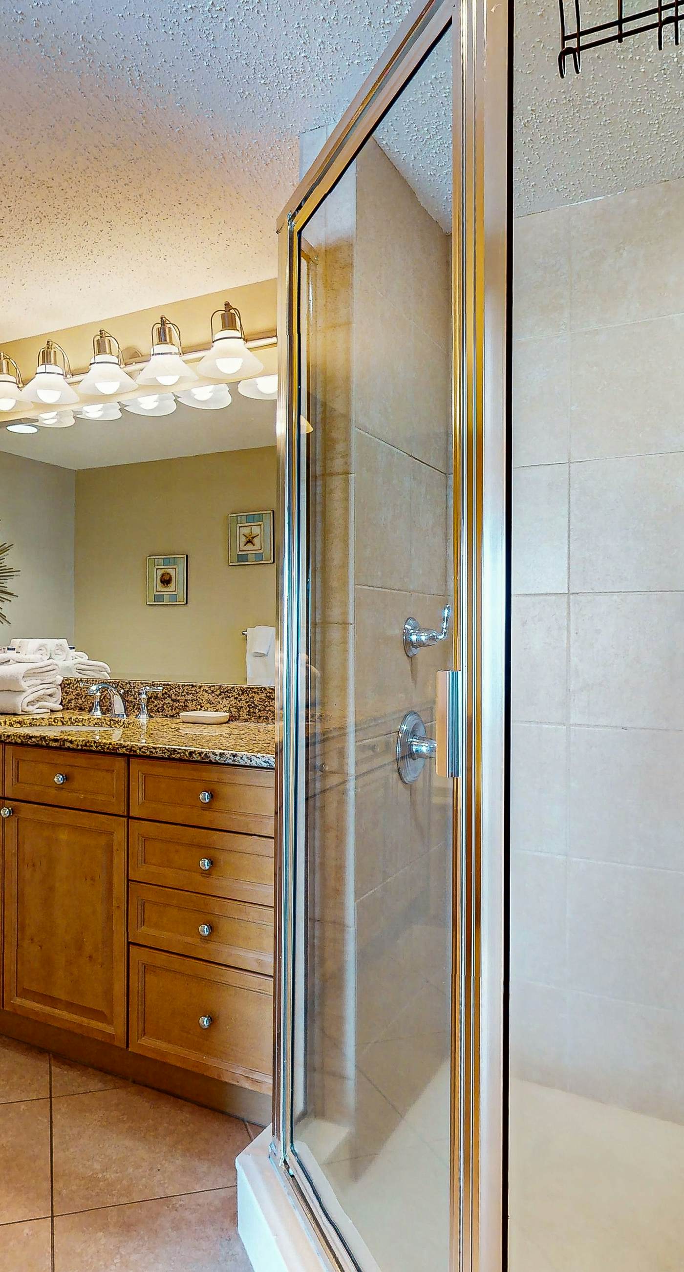 Spacious condo with Gulf-front views & access to pools, hot tub, gym