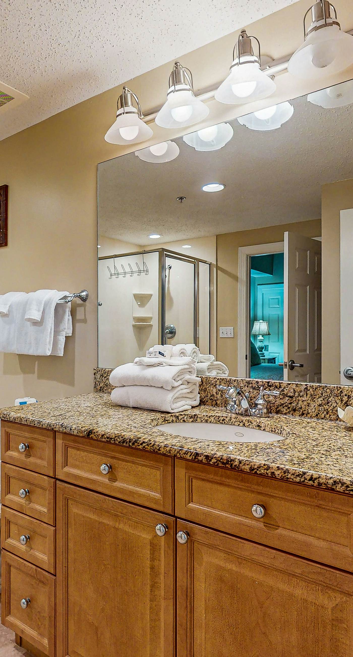 Spacious condo with Gulf-front views & access to pools, hot tub, gym