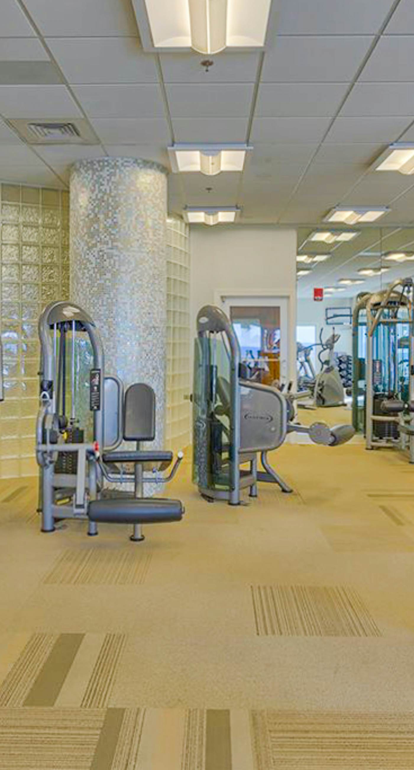 Spacious condo with Gulf-front views & access to pools, hot tub, gym