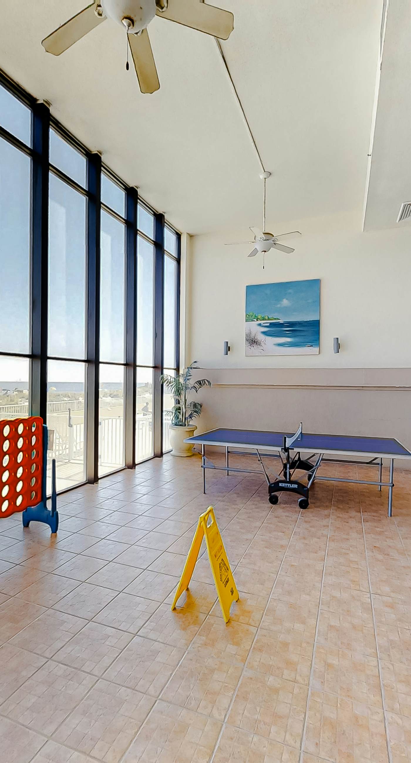 Spacious condo with Gulf-front views & access to pools, hot tub, gym