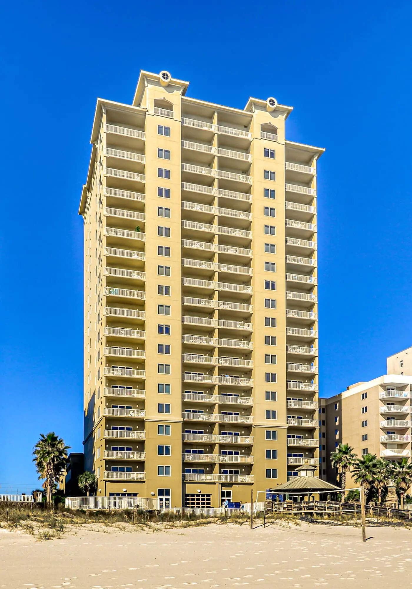 Spacious condo with Gulf-front views & access to pools, hot tub, gym