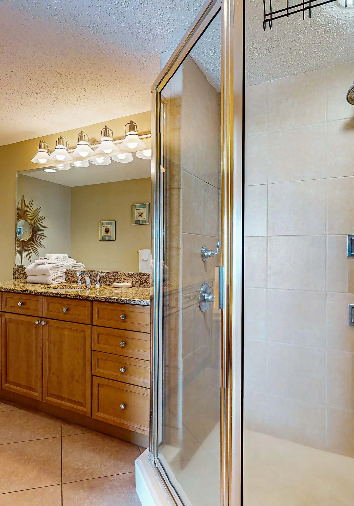 Spacious condo with Gulf-front views & access to pools, hot tub, gym