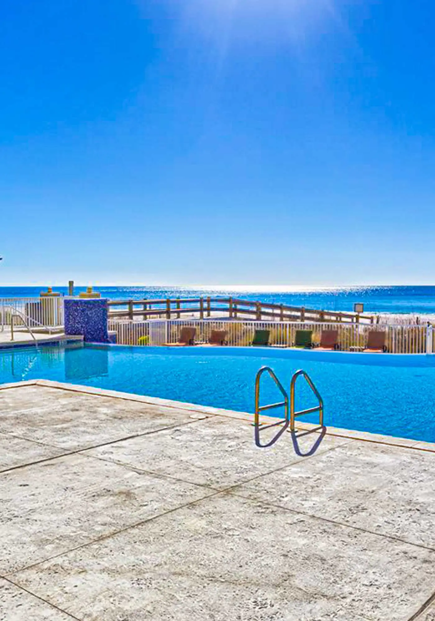 Spacious condo with Gulf-front views & access to pools, hot tub, gym