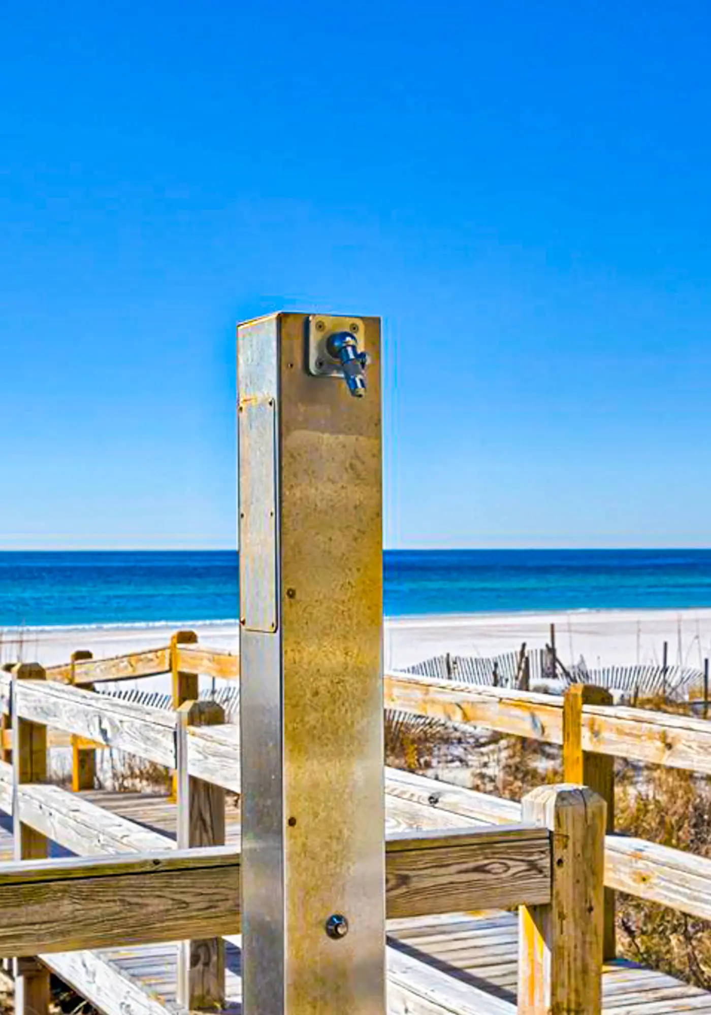 Spacious condo with Gulf-front views & access to pools, hot tub, gym