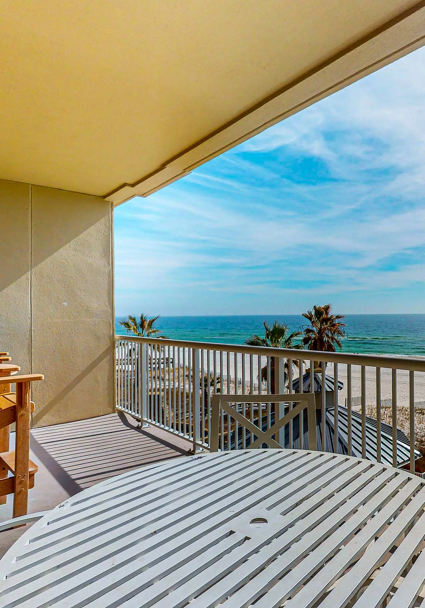 Spacious condo with Gulf-front views & access to pools, hot tub, gym